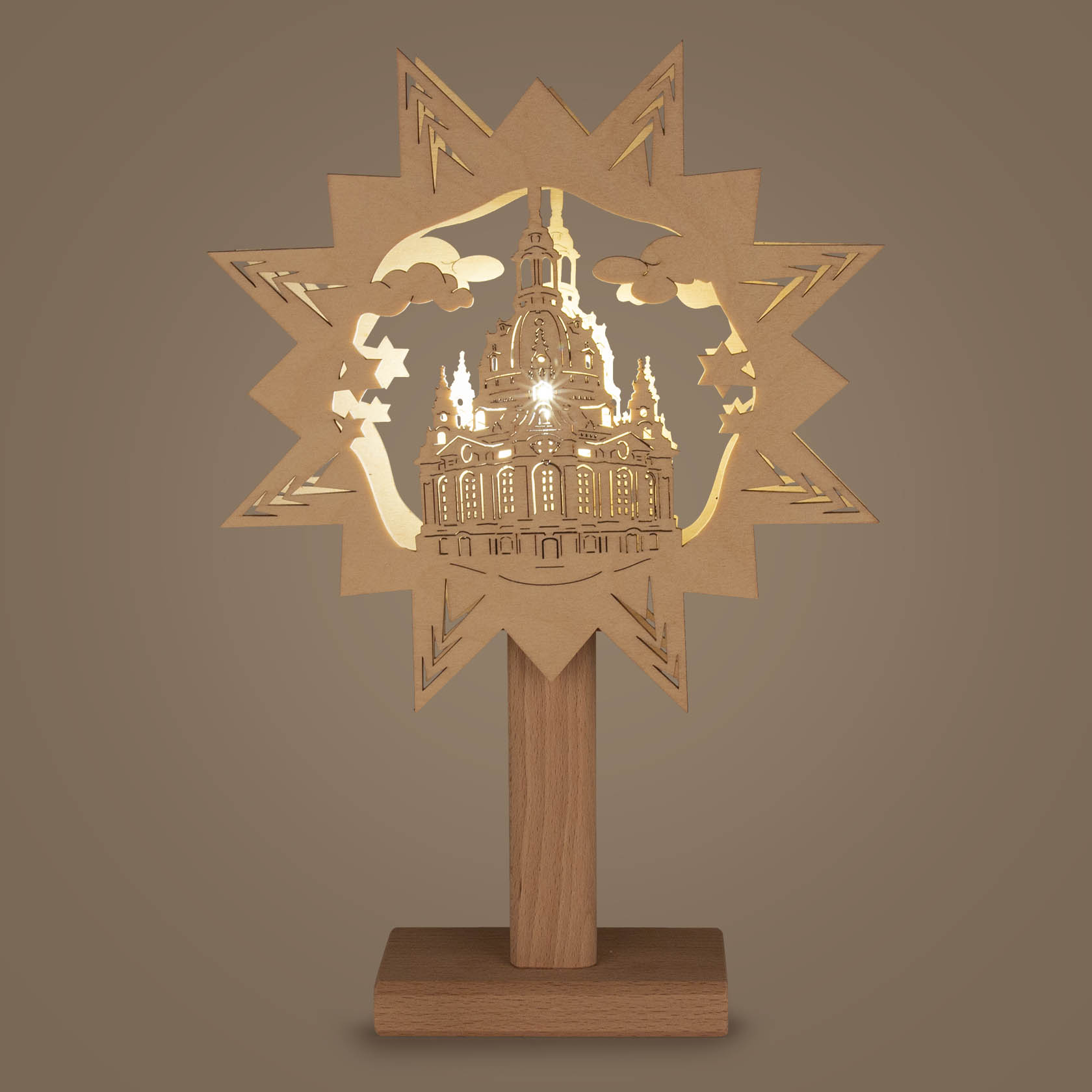 Wooden silhouette of the Frauenkirche on a stand, with electric backlighting highlighting the intricate design.