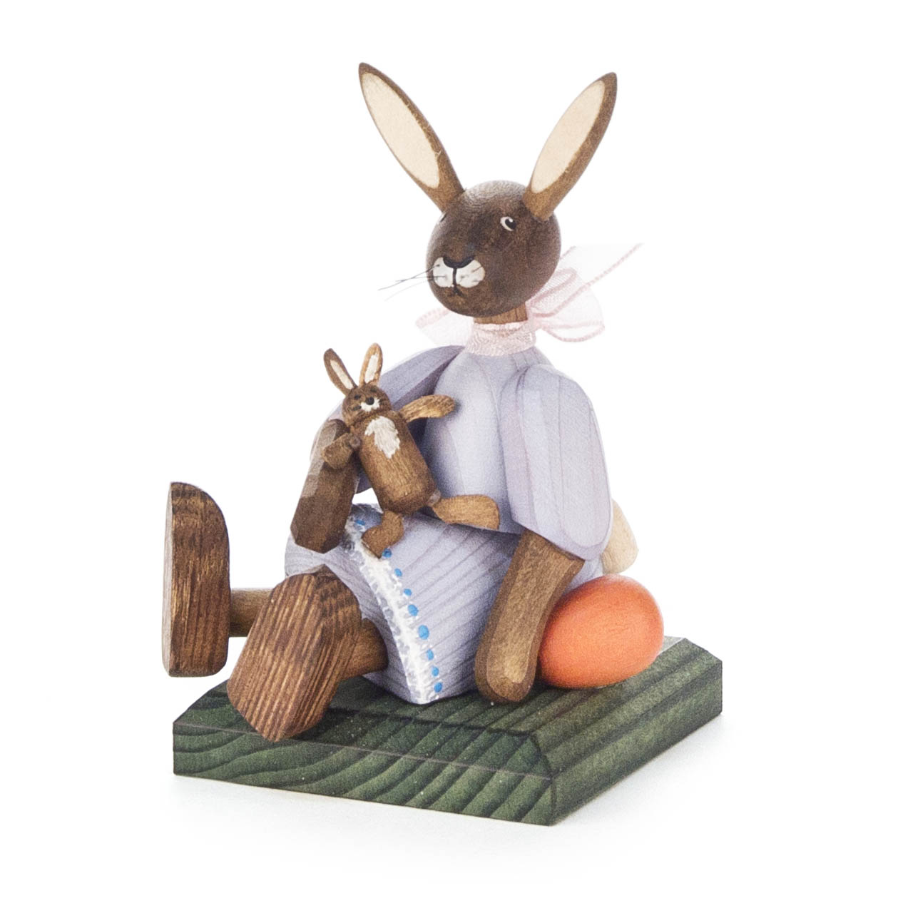 Hasenmädchen mit Puppe, sitzend violett im Dregeno Online Shop günstig kaufen