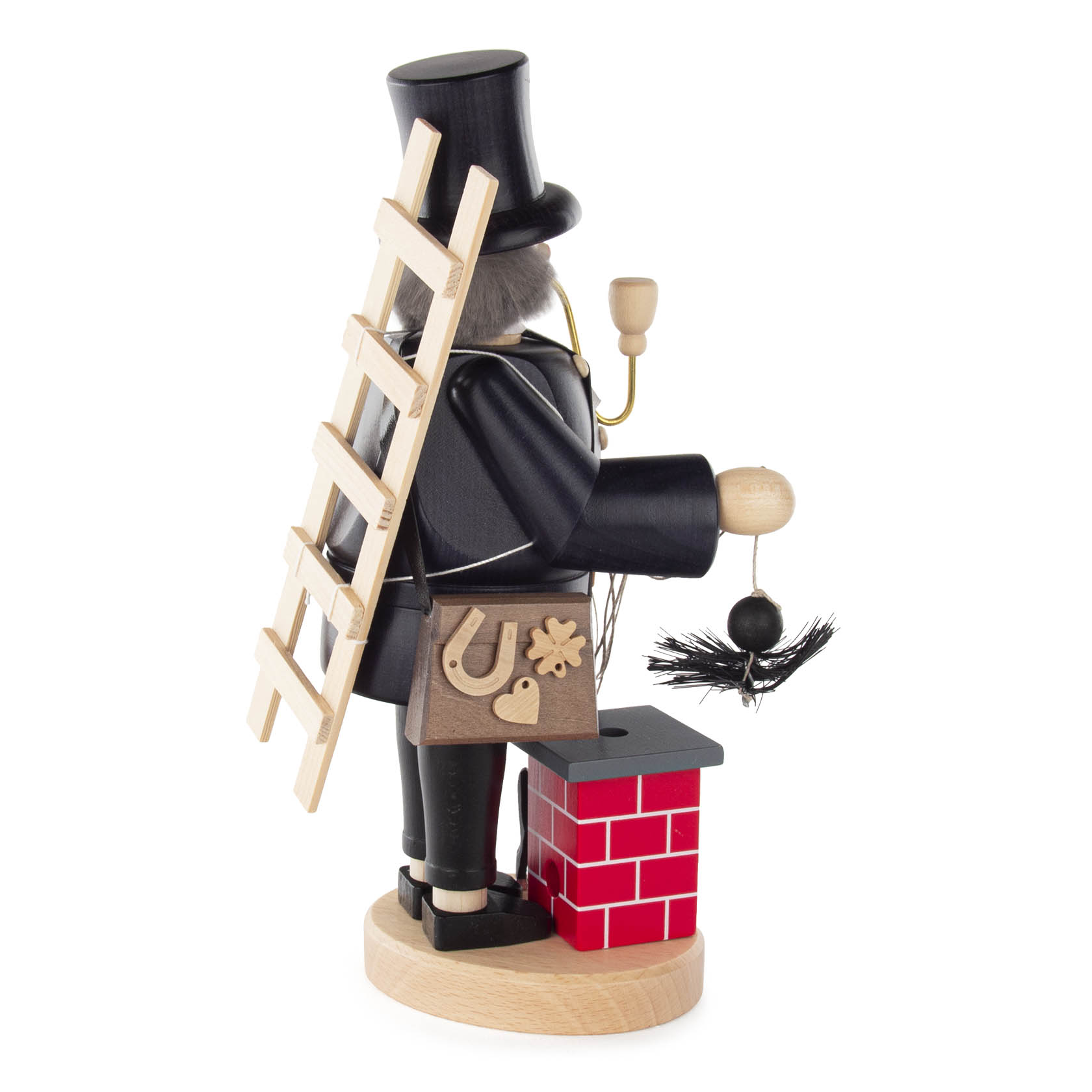 Wooden smoking figure of a chimney sweep with a black top hat, holding a small chimney and a brush. He wears a black suit and carries a ladder.