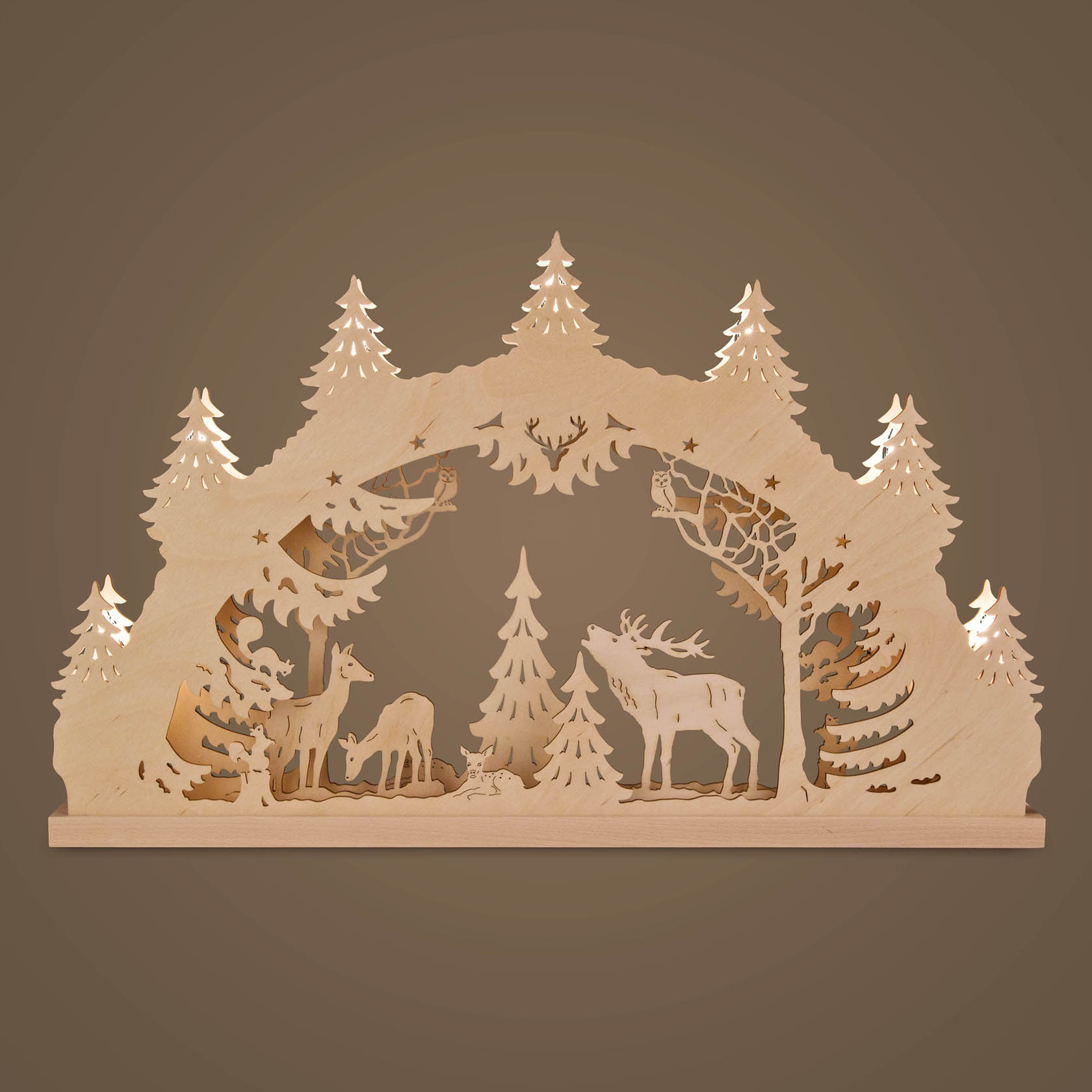 Electric illuminated arch with deer family scene; features a stag, doe, and fawn surrounded by pine trees.