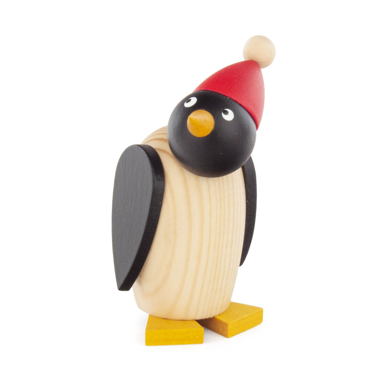 Holzpinguin mit einer roten Mütze, gelbem Schnabel und gelben Füßen, stehende Figur mit schwarzem Kopf, Flügeln und weißlichem Körper. im Dregeno Online Shop günstig kaufen