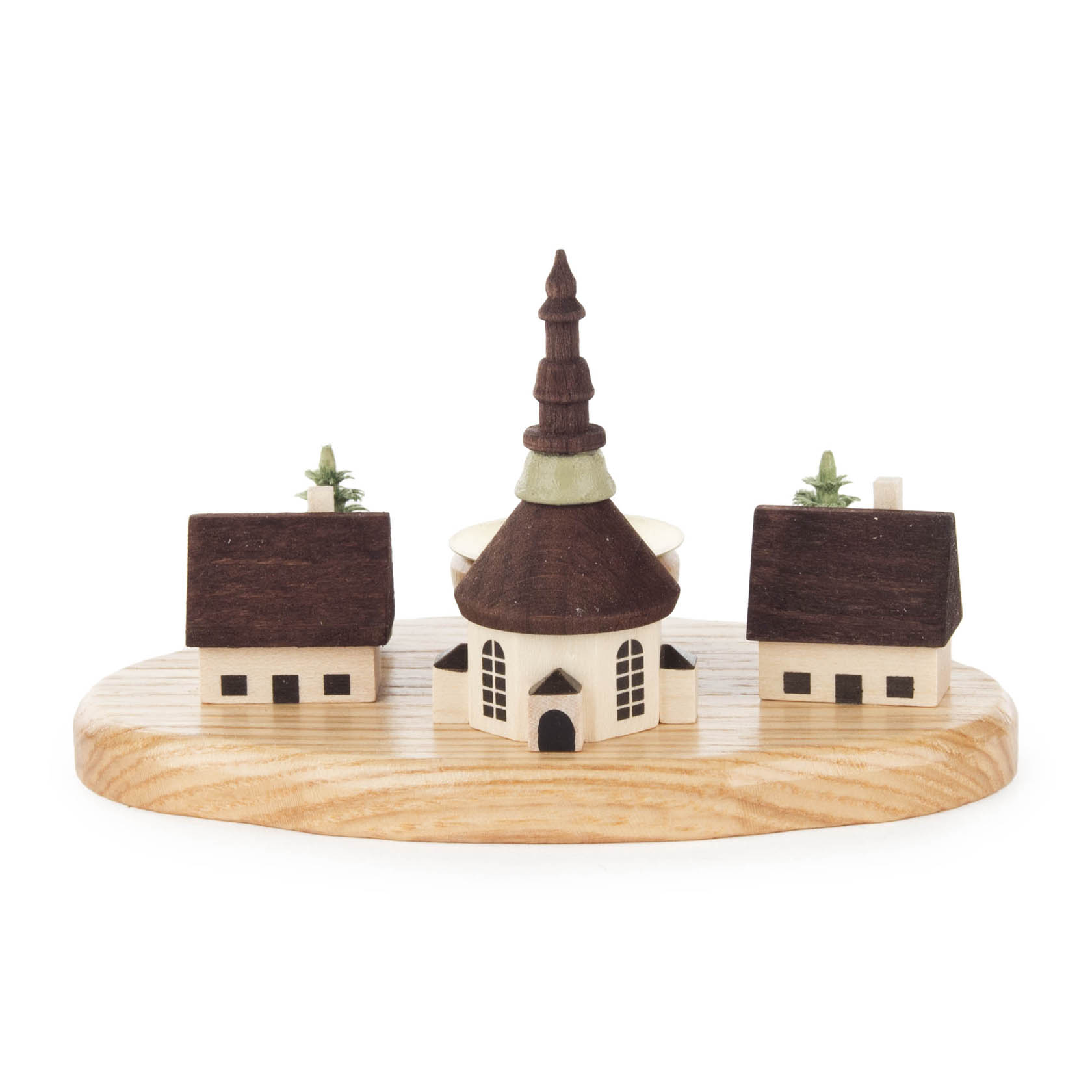 A wooden candle holder depicting the village of Seiffen, featuring a central church with a tall steeple and two smaller houses on either side.