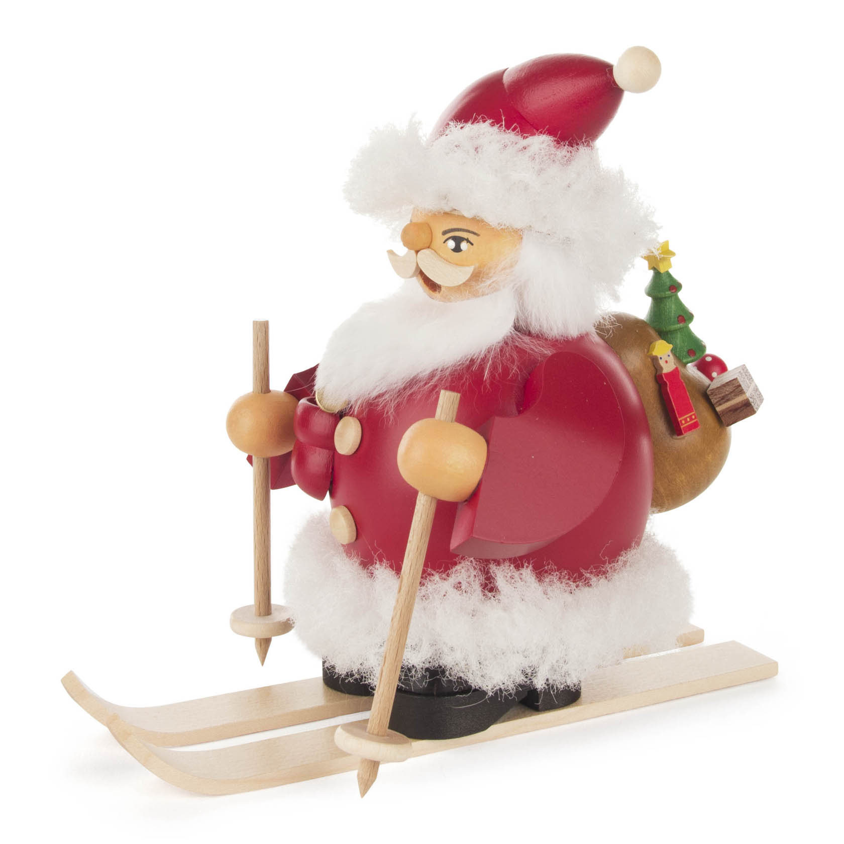 Wooden incense smoker figure of Santa Claus on skis, holding ski poles, with a sack carrying a small Christmas tree on his back. im Dregeno Online Shop günstig kaufen