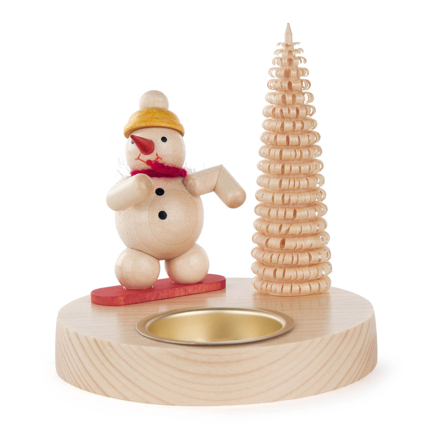 Holzfigur eines Schneemanns mit rotem Schal und gelber Mütze, der auf einem roten Snowboard steht. Daneben ein Teelichthalter und ein spiralförmiger Tannenbaum. im Dregeno Online Shop günstig kaufen