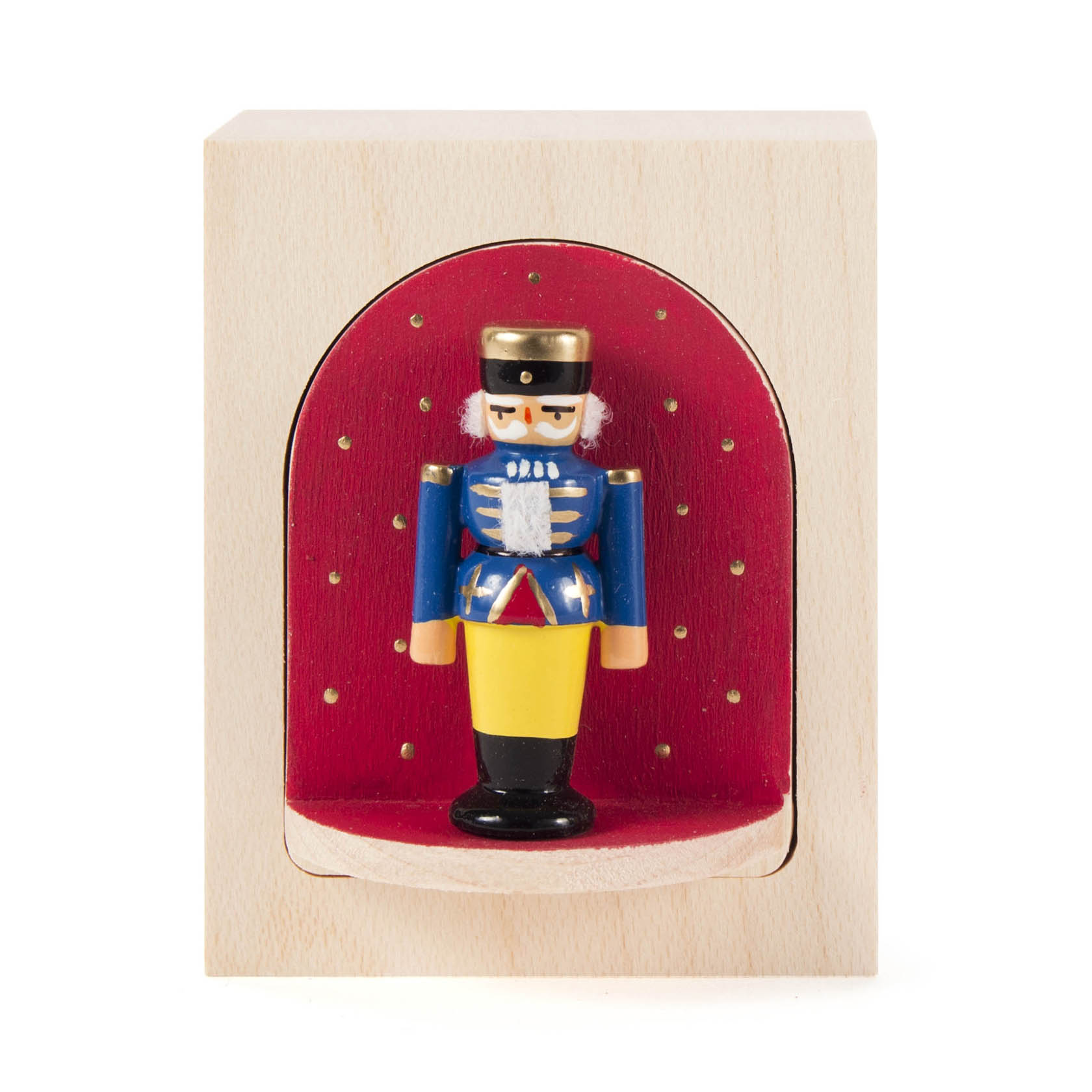 Holz-Nussknacker in Form eines Soldaten in blauer Uniform, gelber Hose und schwarzem Hut in einer Holzbox mit rotem Hintergrund.