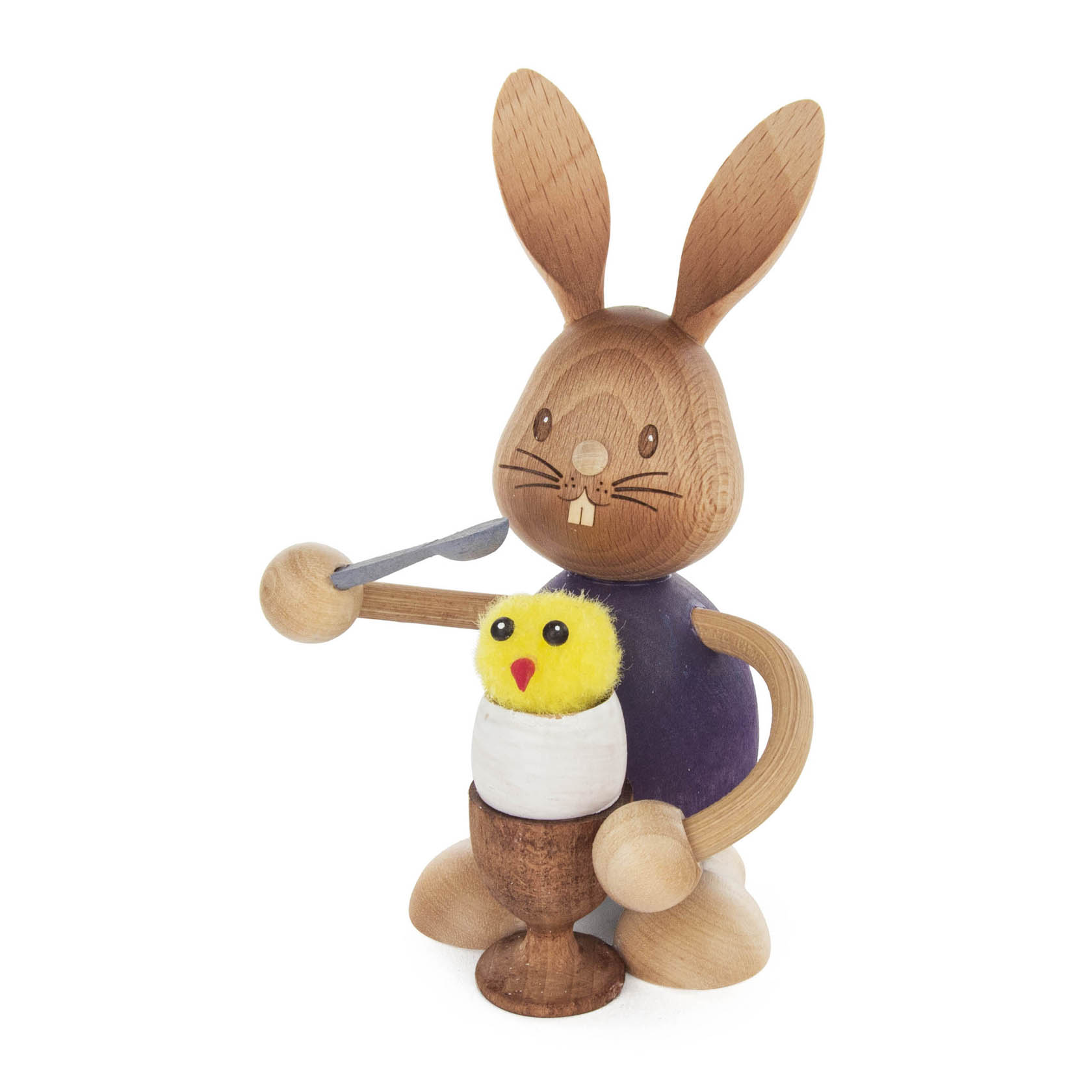 Dekofigur eines Hasen 'Stupsi' aus Holz, hält einen Eierbecher mit einem gelben Küken. im Dregeno Online Shop günstig kaufen
