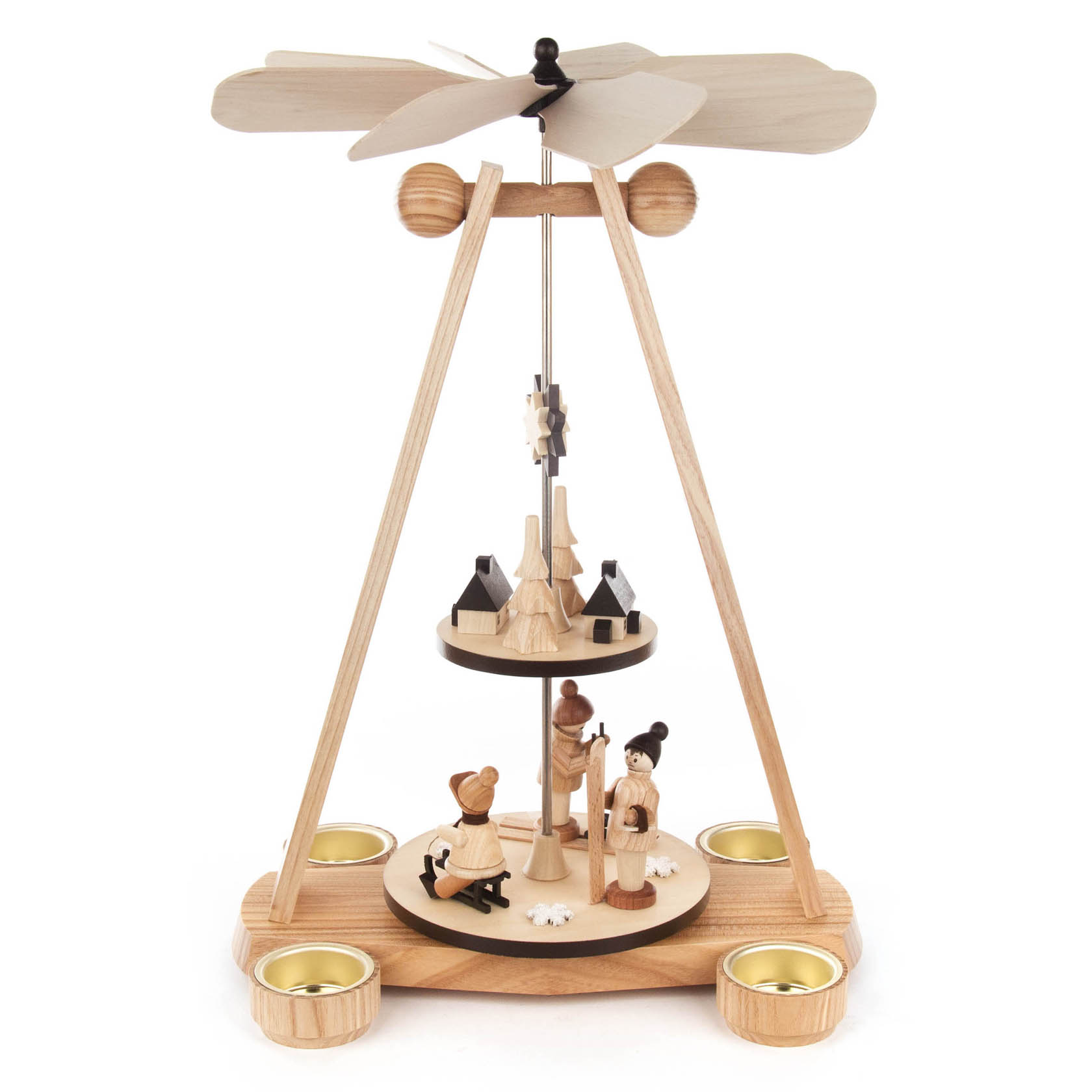 Two-tiered wooden Christmas pyramid with tea light candle holders, featuring a nativity scene and rotating blades at the top.