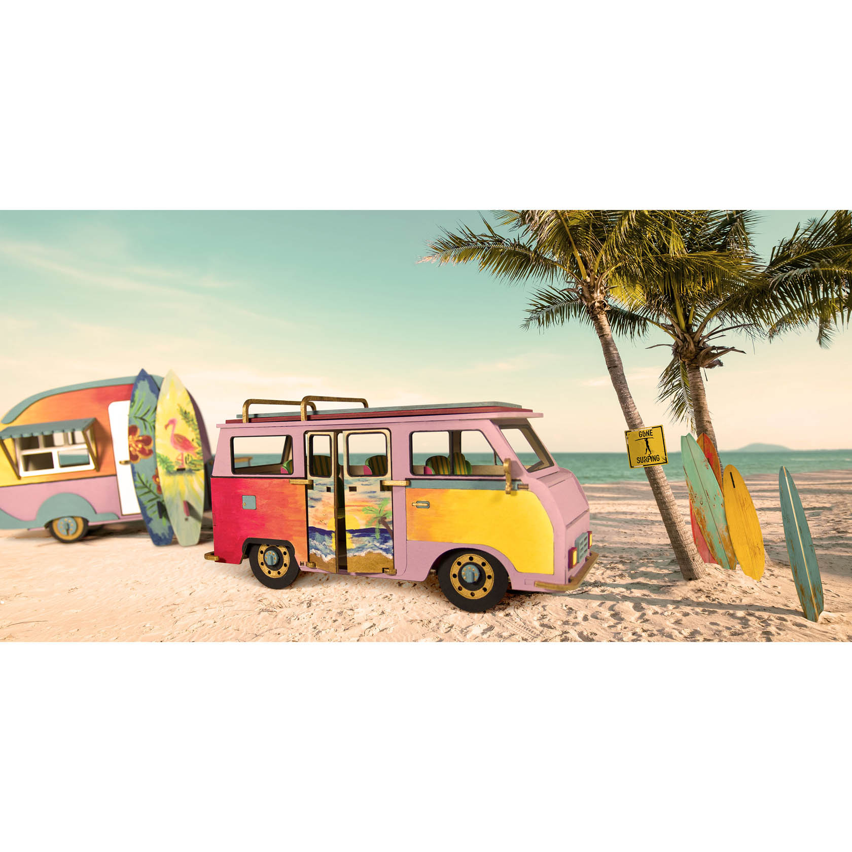 A colorful 3D wooden model of a camping bus with surfboards, next to a palm tree on a beach.