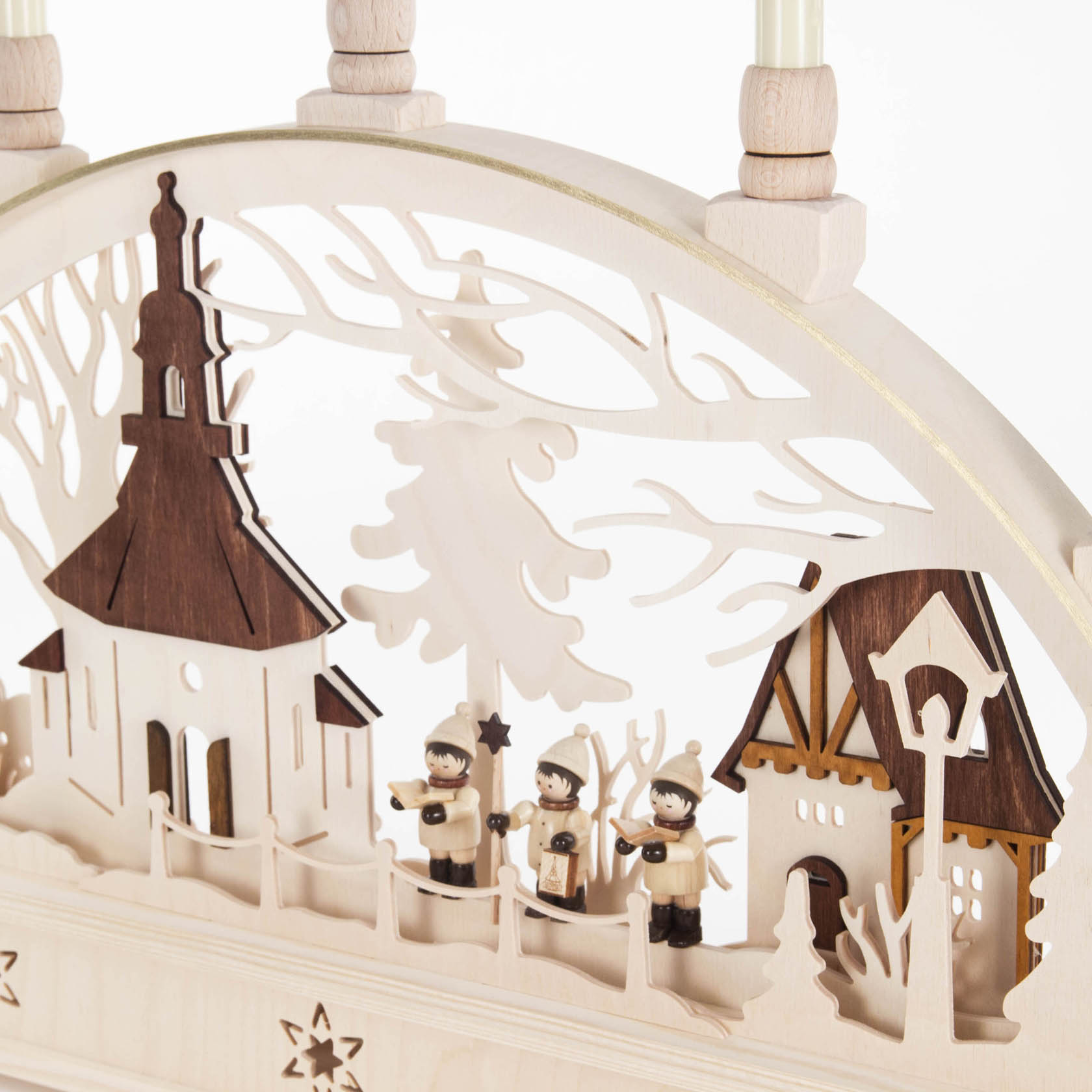 Wooden arch with Seiffen church and choir figures, electrically lit.