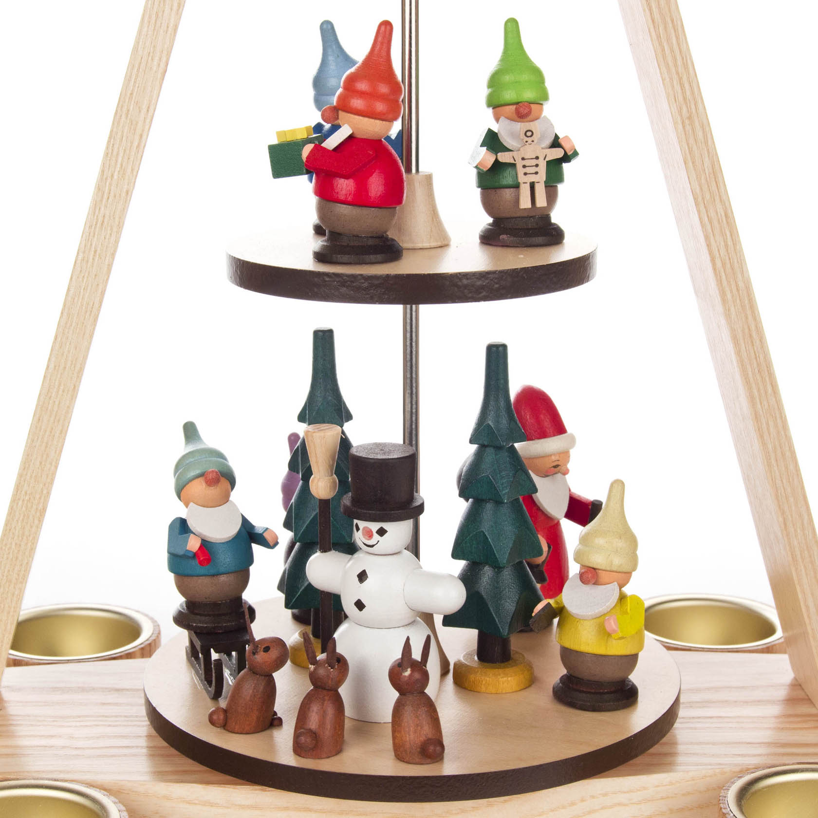 Wooden two-tiered pyramid with six colorful dwarfs, a snowman, trees, and animals, designed to hold tea lights around the base.