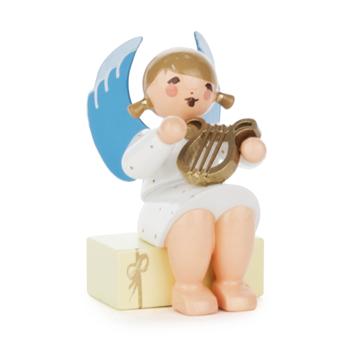 Engel mit Lyra auf Geschenkpaket sitzend im Dregeno Online Shop günstig kaufen