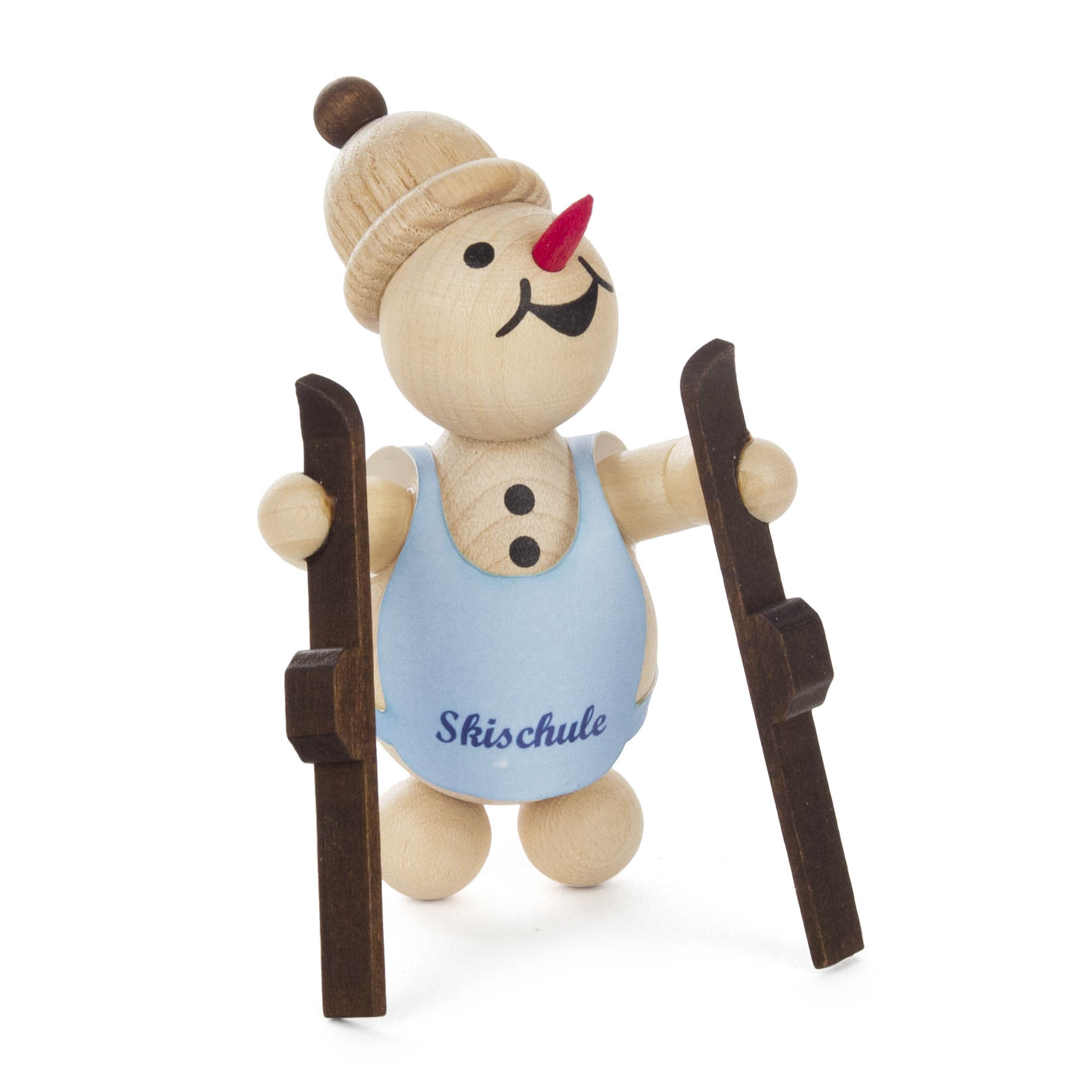 A wooden snowman figure wearing a blue apron with 'Skischule' written on it, holding two skis, and looking upward with a cheerful expression. im Dregeno Online Shop günstig kaufen