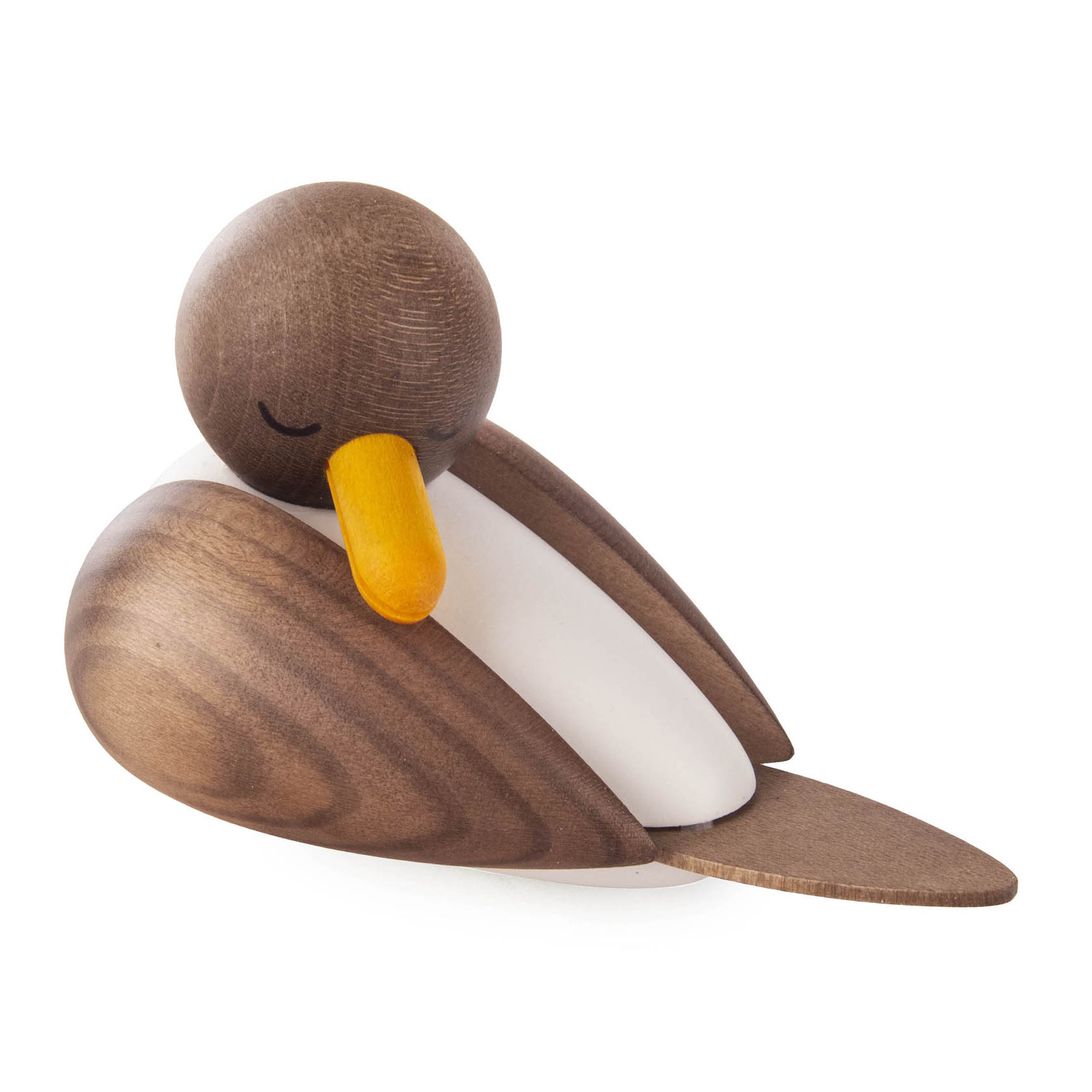A wooden sculpture of a sleeping seagull with a grey body, orange beak, and closed eyes.