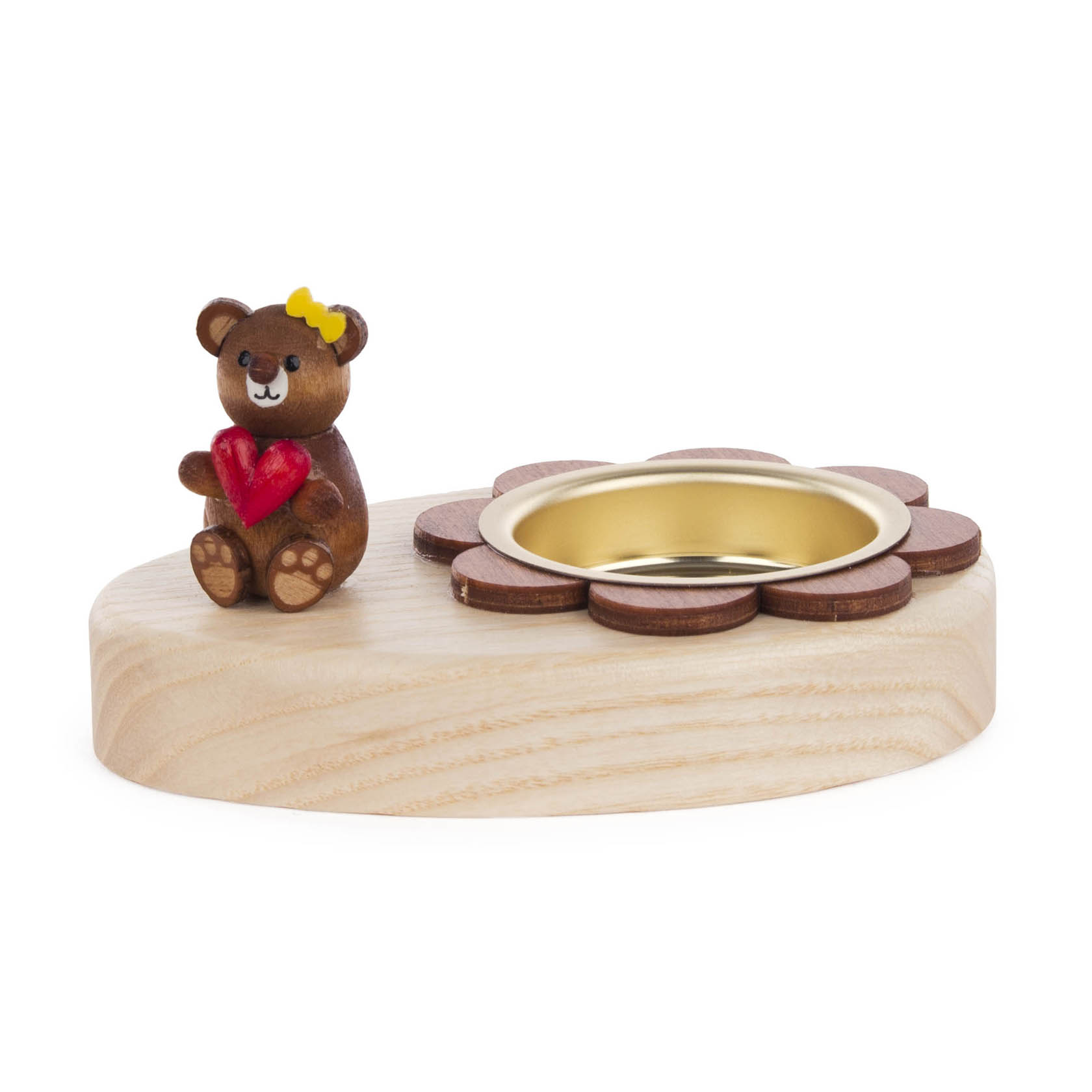 Ein Teelichthalter aus Holz in Form einer Blume mit einer Metallkammer für das Teelicht. Rechts sitzt ein kleiner Holz-Teddy mit gelber Schleife und rotem Herz. im Dregeno Online Shop günstig kaufen