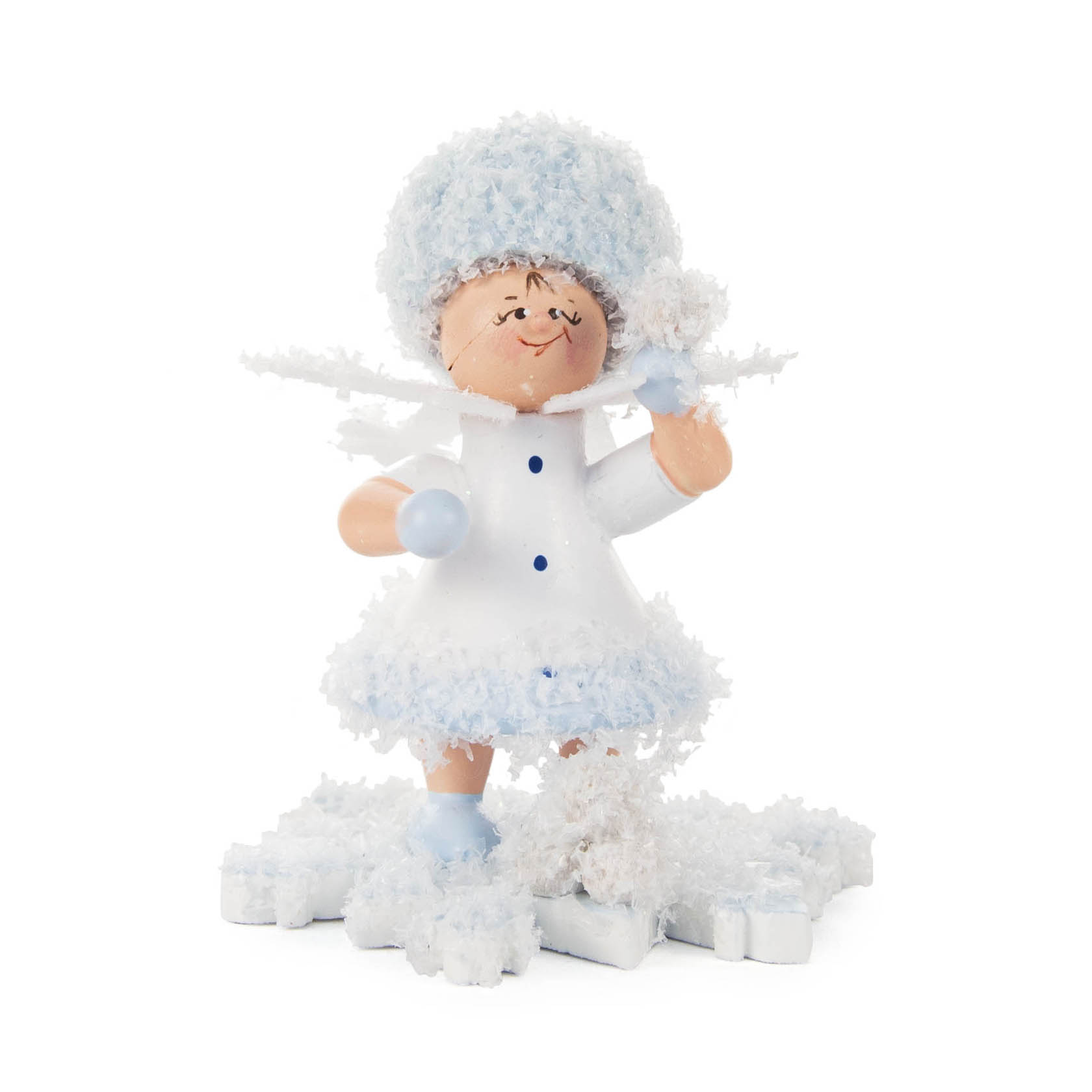A smiling snow-themed figure with a fluffy hat and dress, holding a snowball ready to throw, standing on a large snowflake. im Dregeno Online Shop günstig kaufen