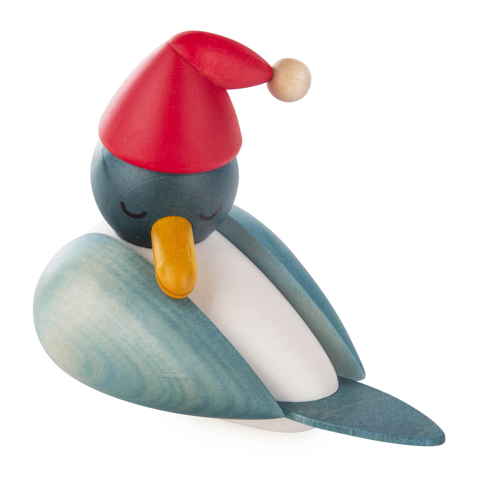A wooden figurine of a sleeping seagull with a red Santa hat and closed eyes. im Dregeno Online Shop günstig kaufen