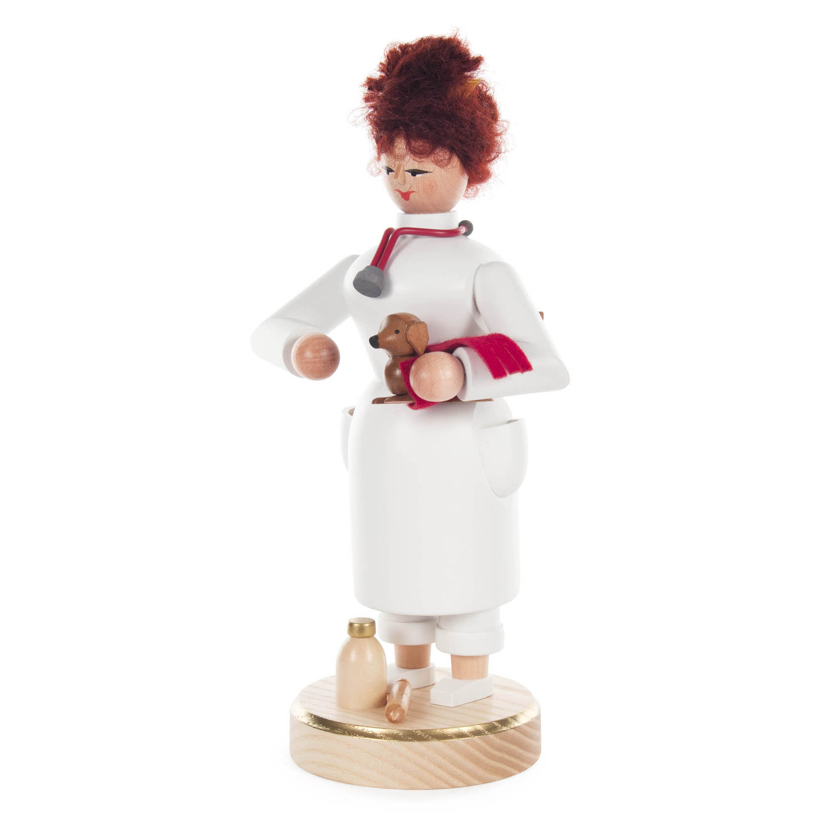 Figurine of a female veterinarian with red hair in a white coat, holding a small brown dog and a red folder, with a stethoscope around her neck.