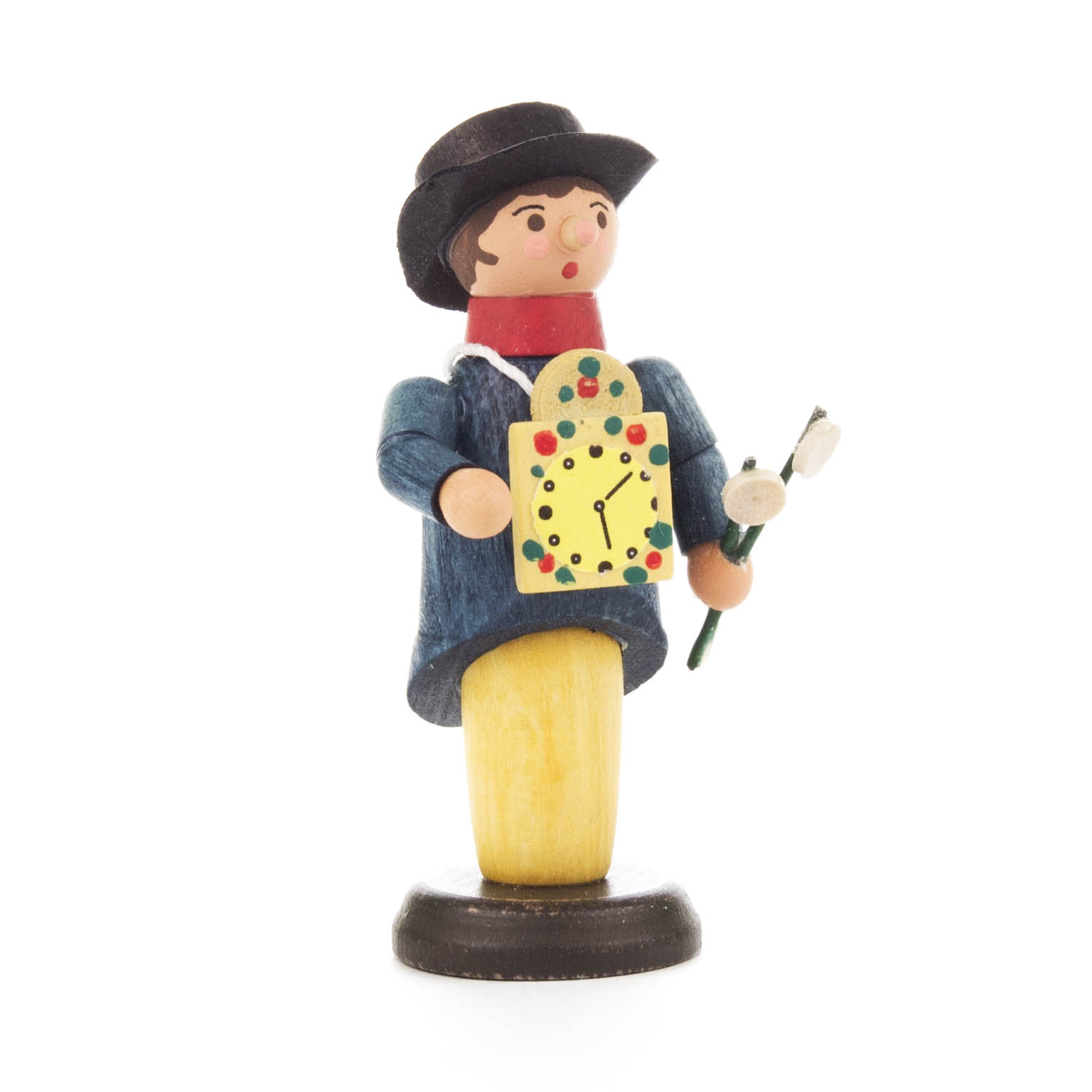Ein Holzfigur eines Schwarzwälder Uhrenschildmalers mit gelbem Ziffernblatt und Pinsel, trägt dunkelblauen Mantel und schwarzen Hut.
