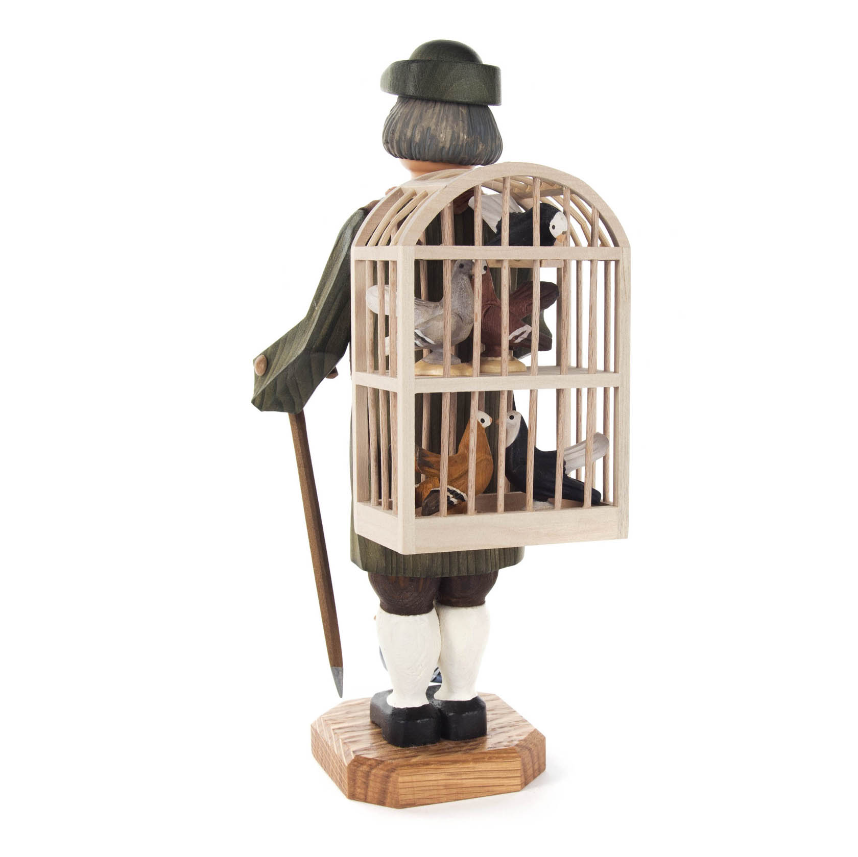 Back view of a smoker figure, designed as a bird seller carrying a large birdcage with pigeons, wearing traditional attire and a hat.