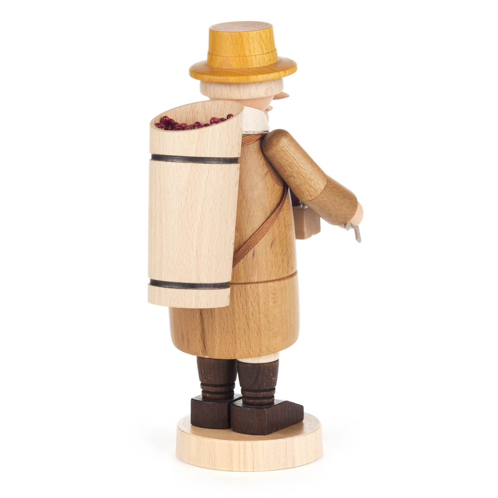 Wooden smoker figurine of a winemaker with a yellow hat, carrying a barrel of grapes on his back, standing on a round base.