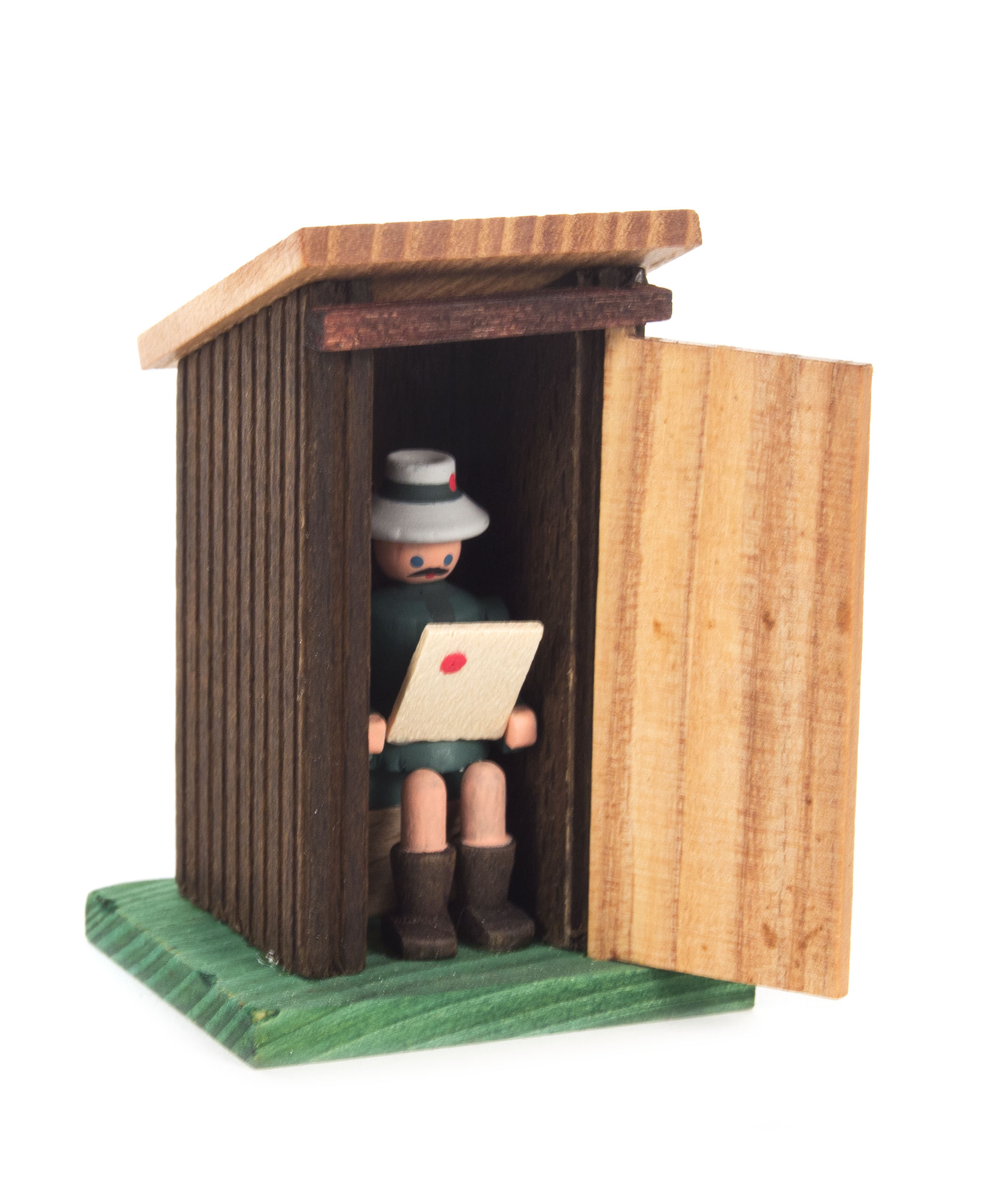 Toilettenhäuschen mit Junge  