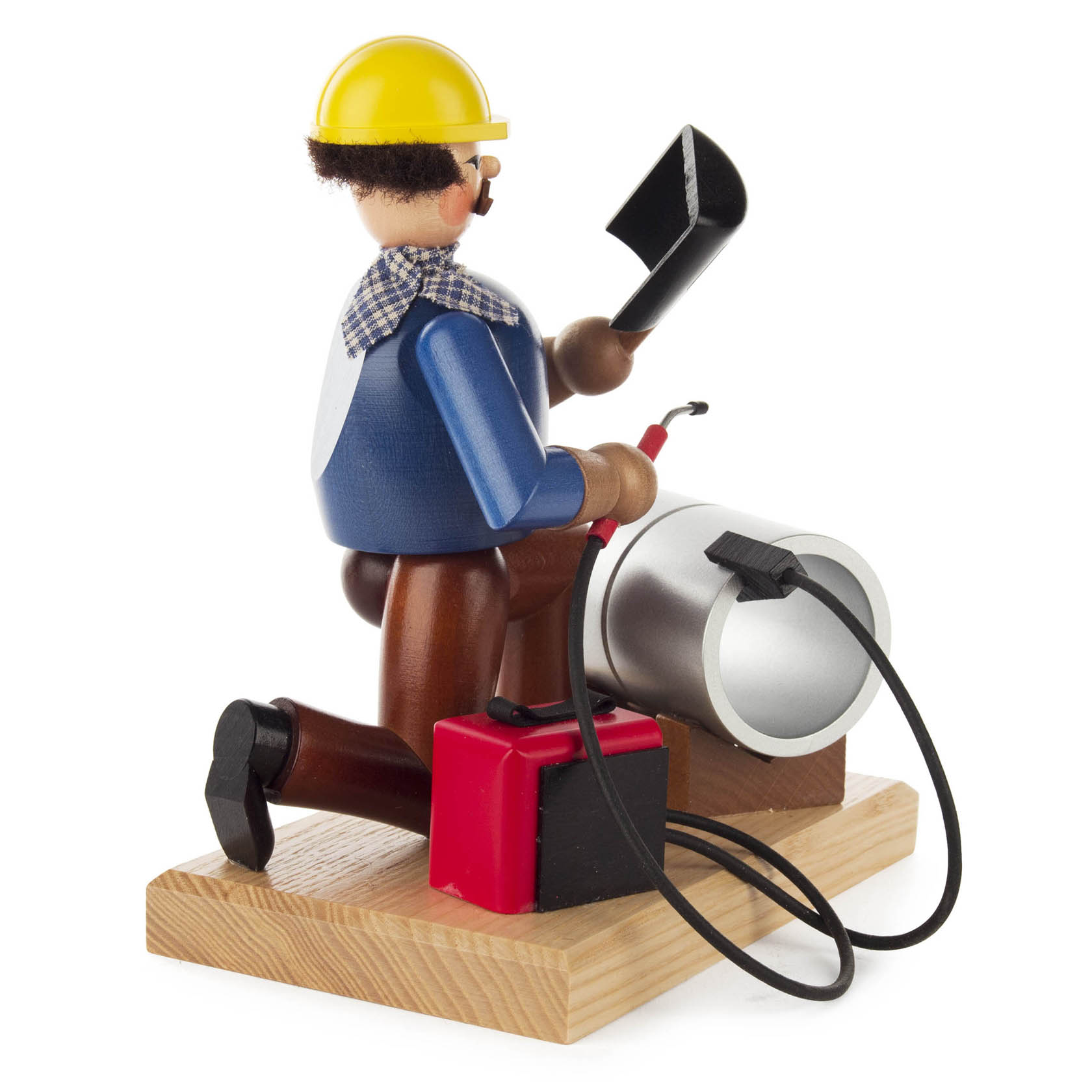 Wooden incense smoker figure depicting a welder with a yellow helmet, kneeling next to welding equipment and a metal cylinder.