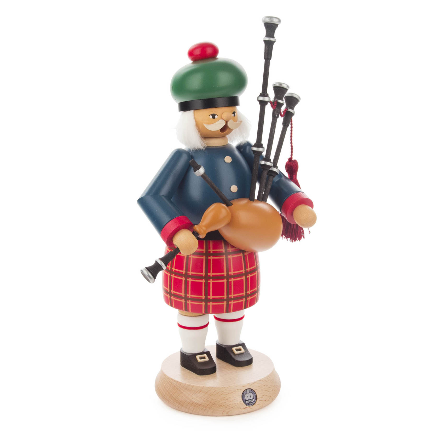 Wooden incense smoker figure of a Scottish man with a green beret, mustache, blue jacket, red tartan kilt, and holding a bagpipe.