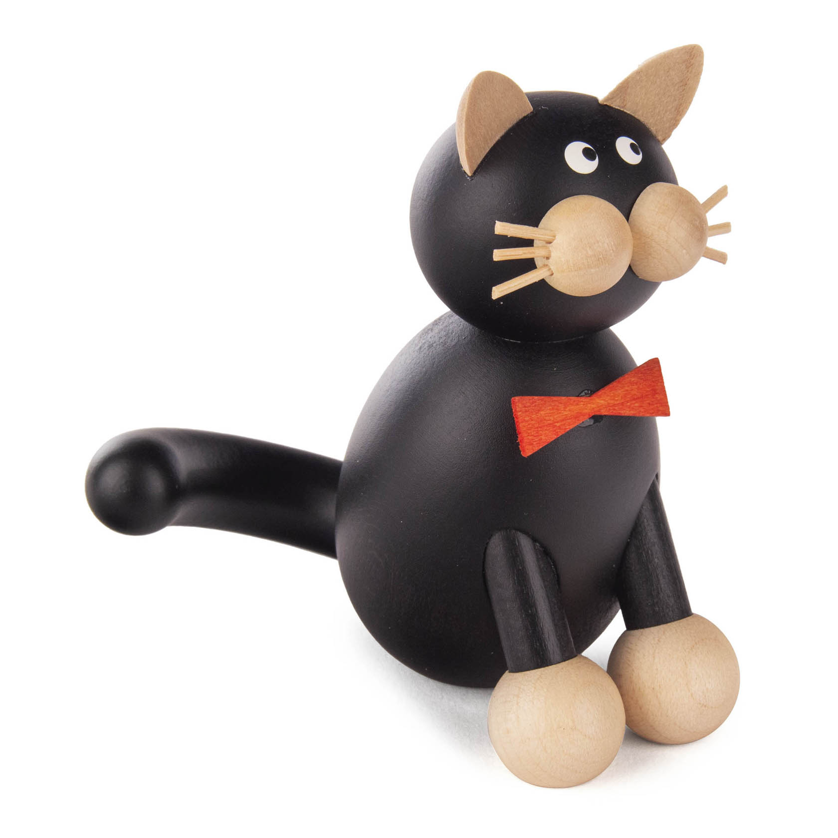 Holzfigur einer sitzenden schwarzen Katze namens Onkel Kurt mit Fliege, großen Augen und kugelrundem Kopf. im Dregeno Online Shop günstig kaufen