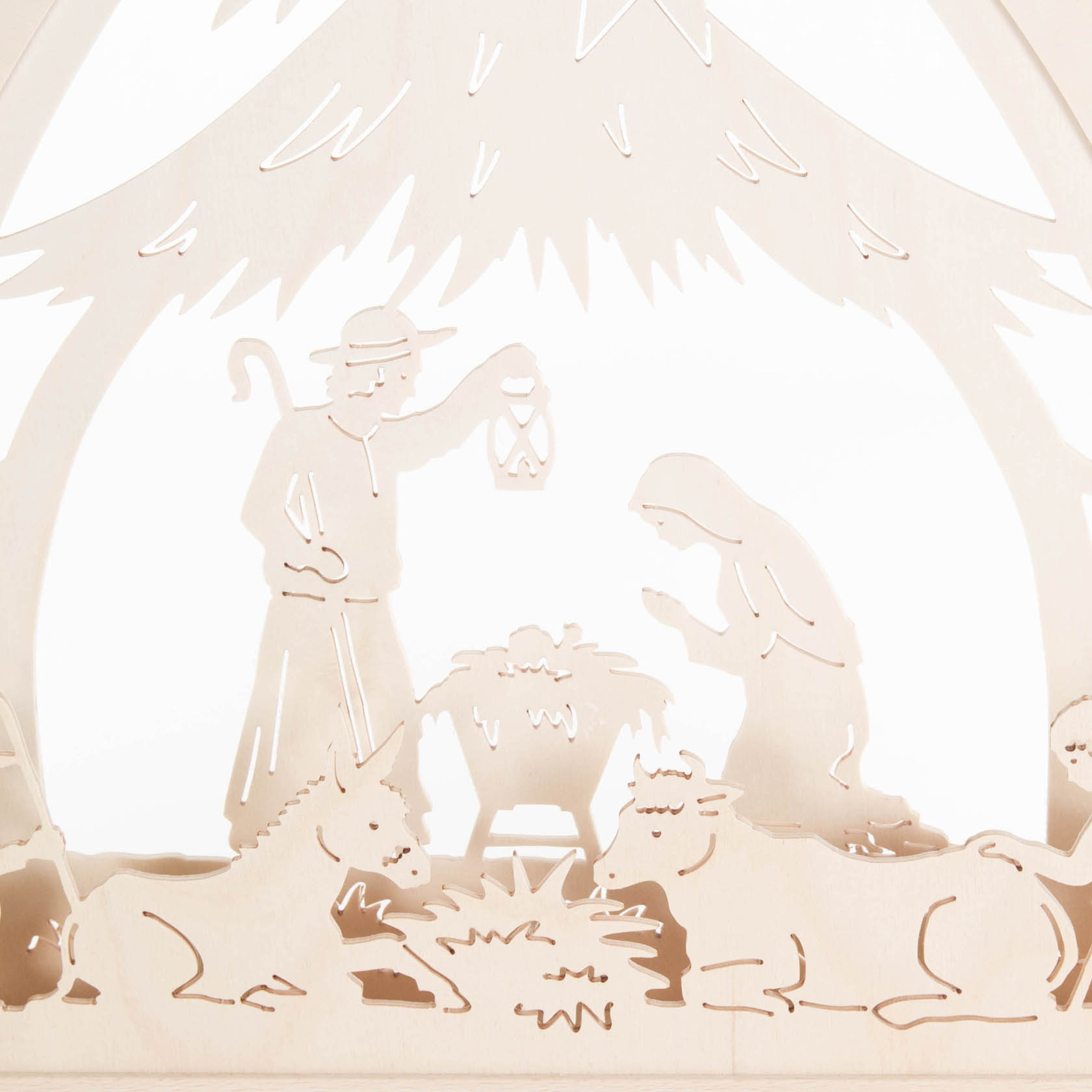Wooden arch with a nativity scene, featuring Mary, Joseph, baby Jesus in a manger, two donkeys, and illuminated with electric lights.