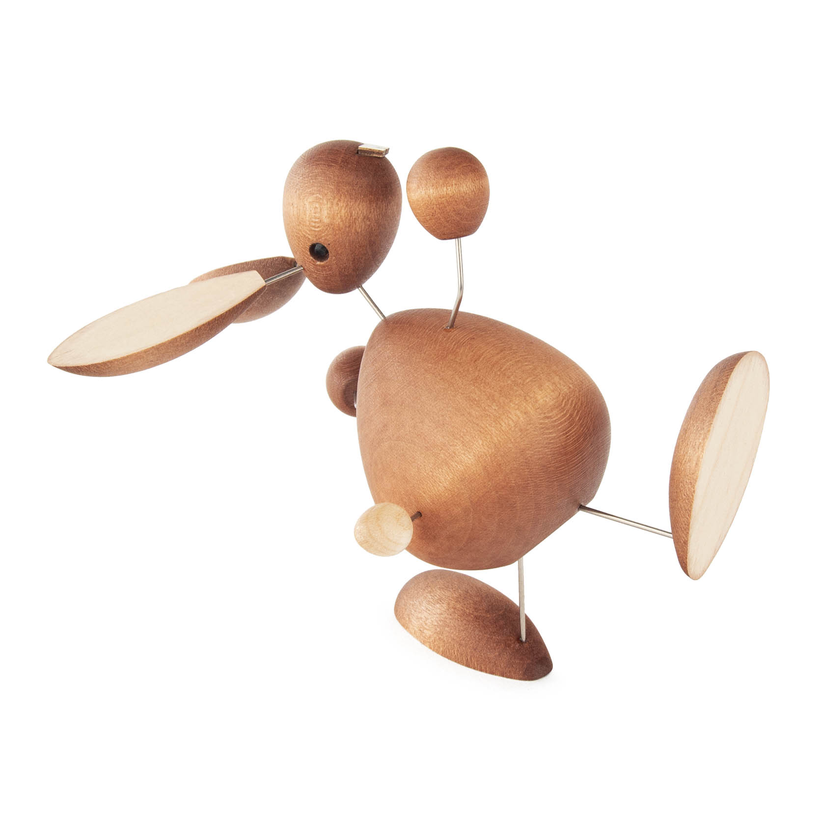 A wooden rabbit figurine balancing on one leg with large ears, a round body, and a playful posture. im Dregeno Online Shop günstig kaufen