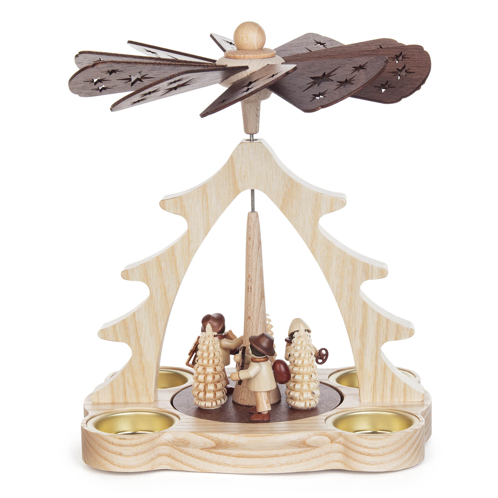 A wooden candle pyramid featuring a three-paneled arch with cut-out designs. Below, three carved figurines of Christmas carolers stand in the center.
