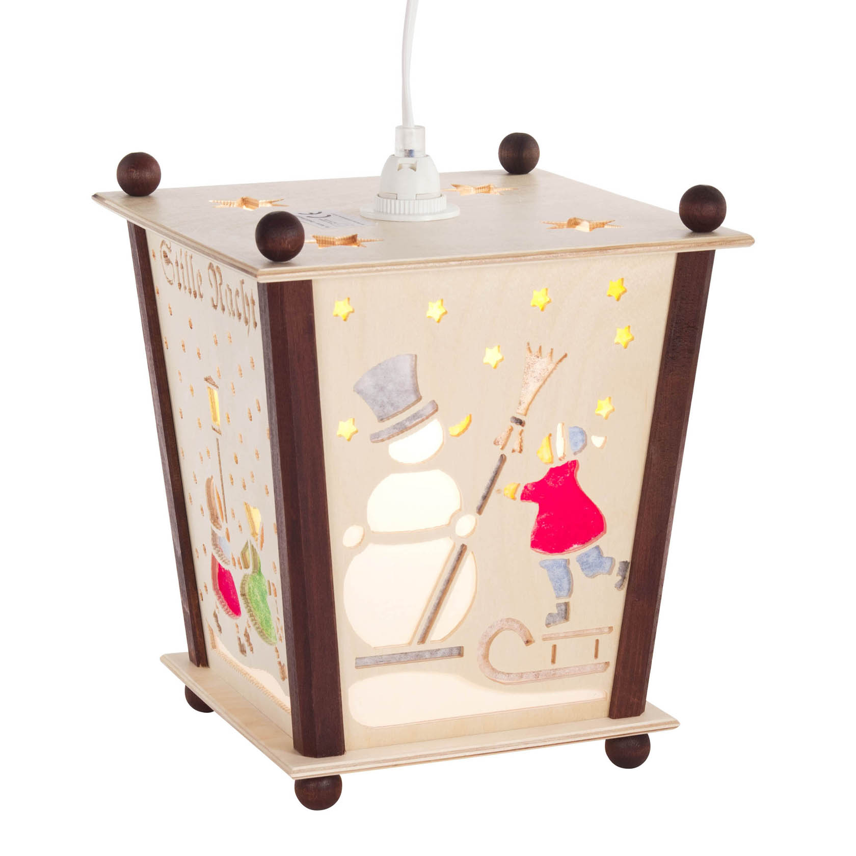 Wooden lantern with electric lighting, featuring cut-outs of a snowman, Santa Claus, children, and a house with decorative stars.