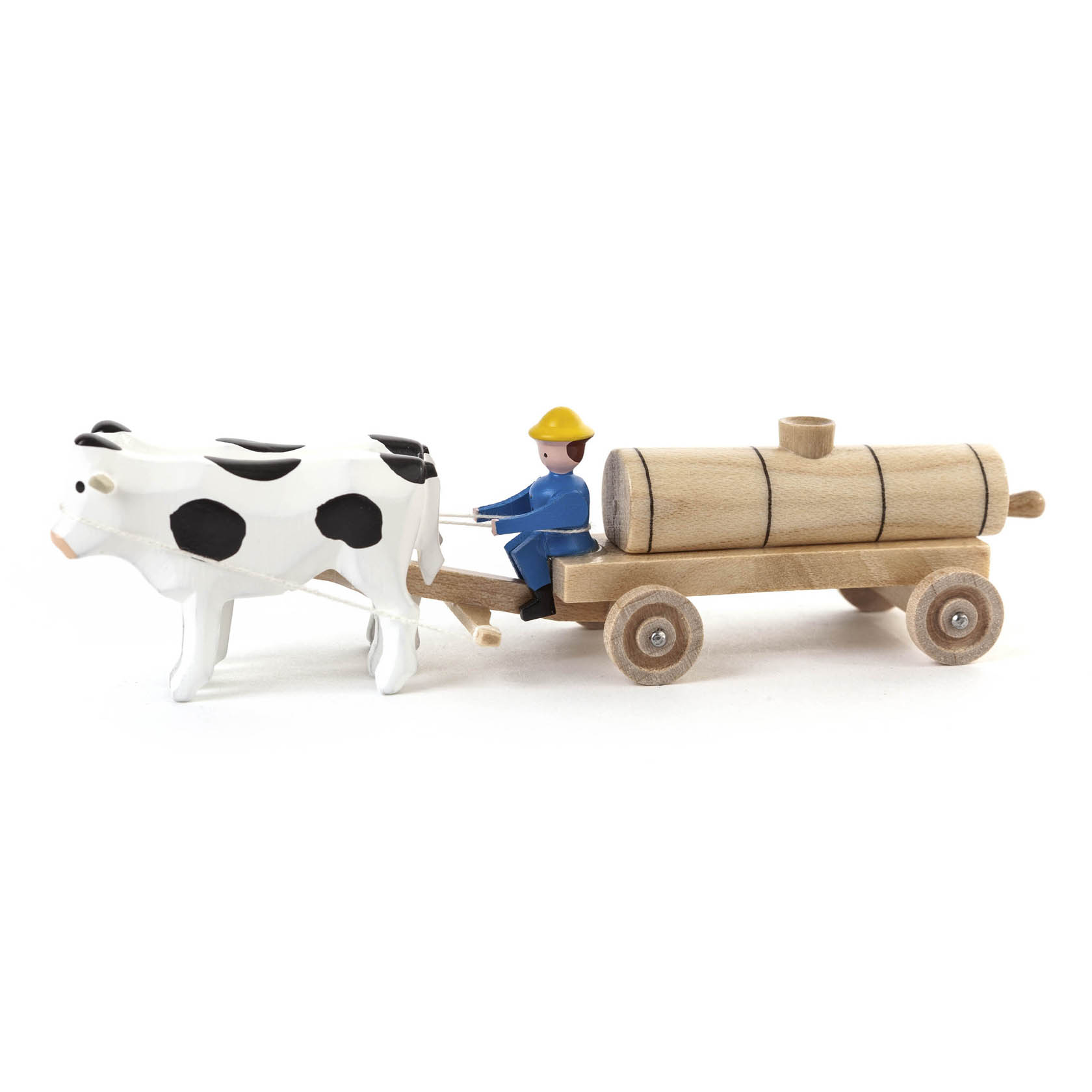 Ein Modell eines Gespanns bestehend aus einem schwarz-weiß gefleckten Ochsen, der einen Jauchewagen mit Holzfass zieht. Ein Mann in blauer Kleidung sitzt auf dem Wagen. im Dregeno Online Shop günstig kaufen