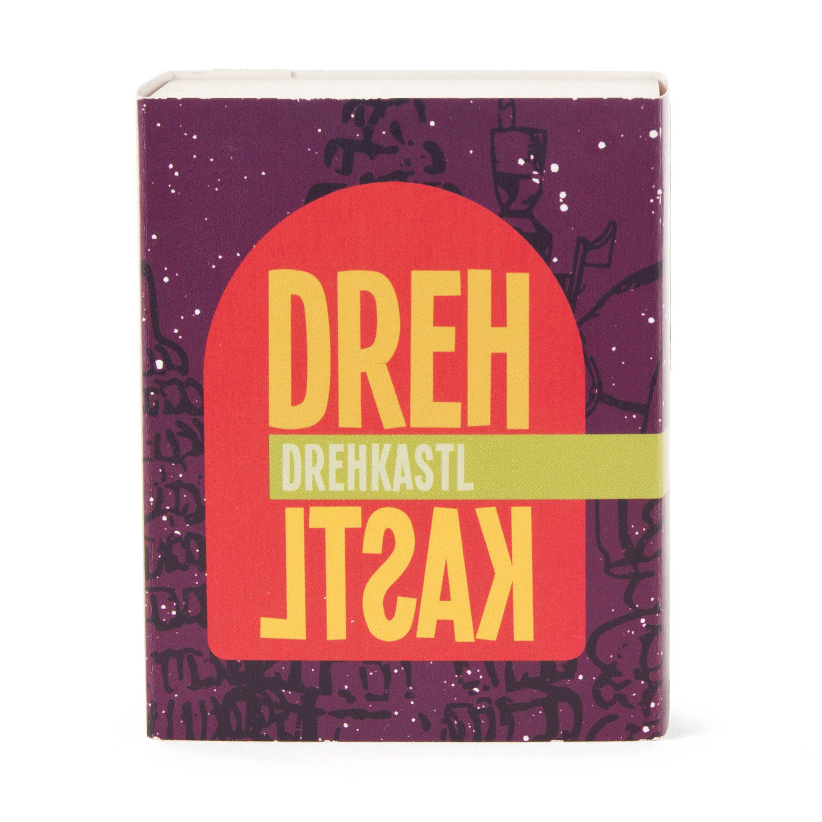Verpackung eines Drehkastl-Nussknackers mit graphischem Design in Rot und Gelb auf violettem Hintergrund.