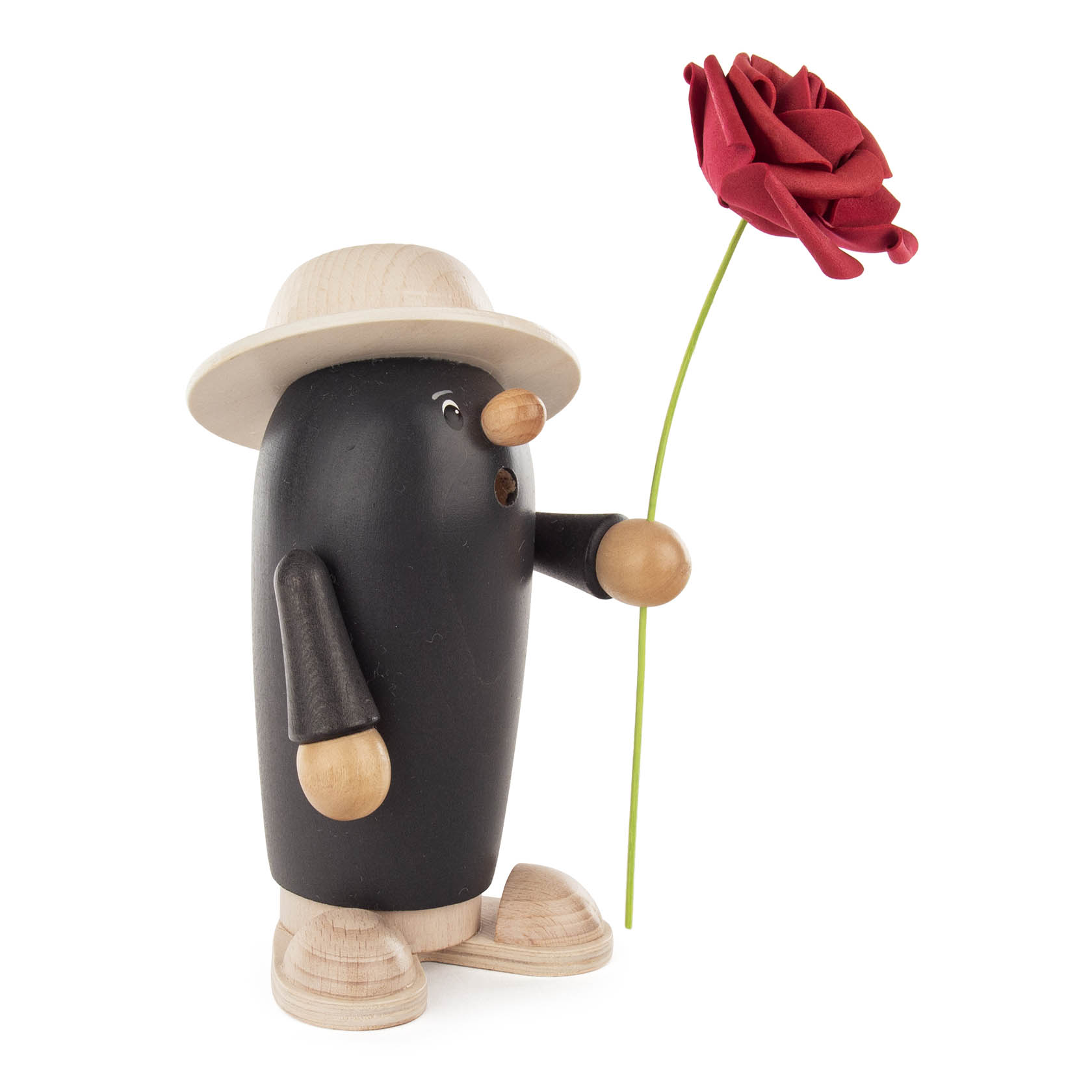 Räucherfigur aus Holz: Ein stilisierter Mann in grau/weißem Outfit mit Hut hält eine rote Rose in der Hand.