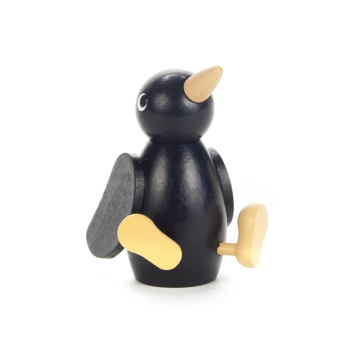 Wooden raven figure with a black body, orange beak and feet, and black wings, resembling a cartoon-style bird.
