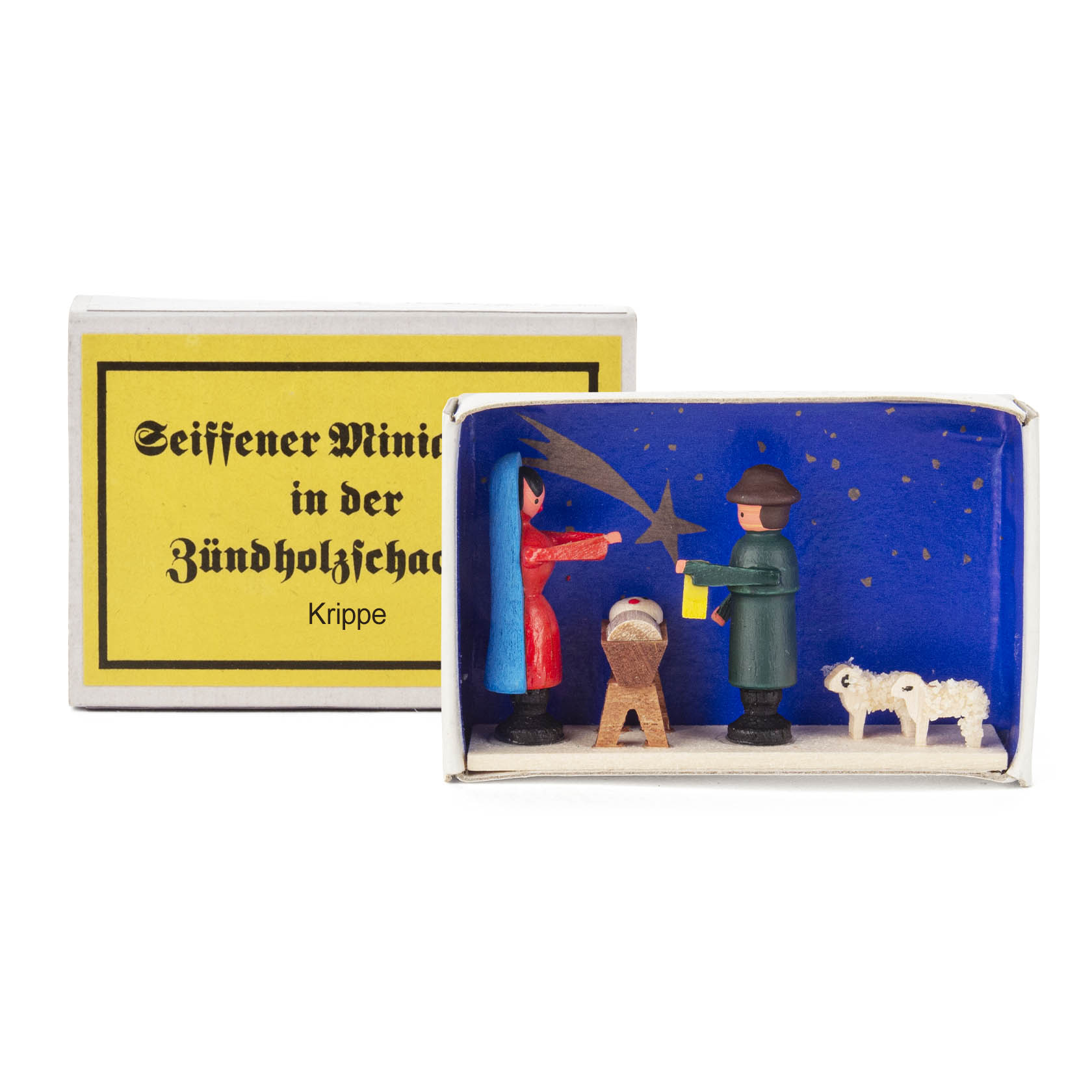 Miniaturkrippe in einer Zündholzschachtel mit Maria, Josef, dem Jesuskind in der Krippe und einem Schaf. Hintergrund in Blau mit Sternen verziert.
