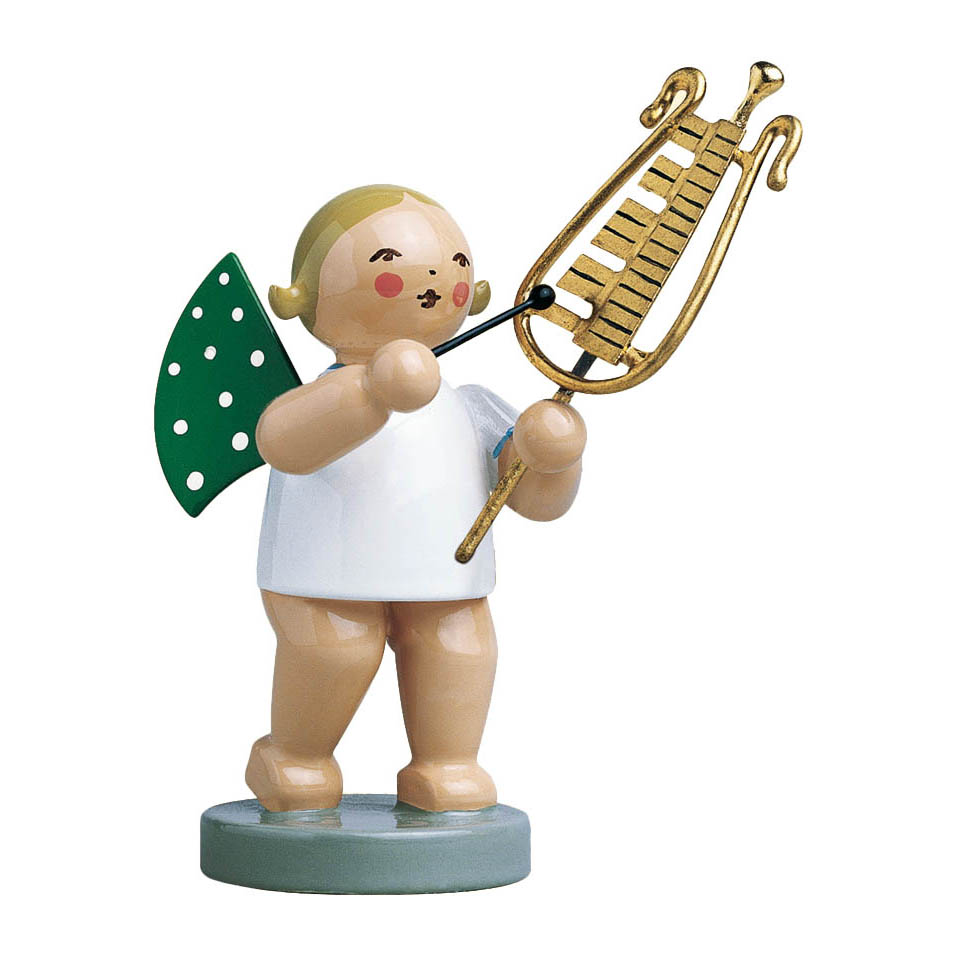 Figurine of an angel with blonde hair and green wings, holding a glockenspiel and baton.
