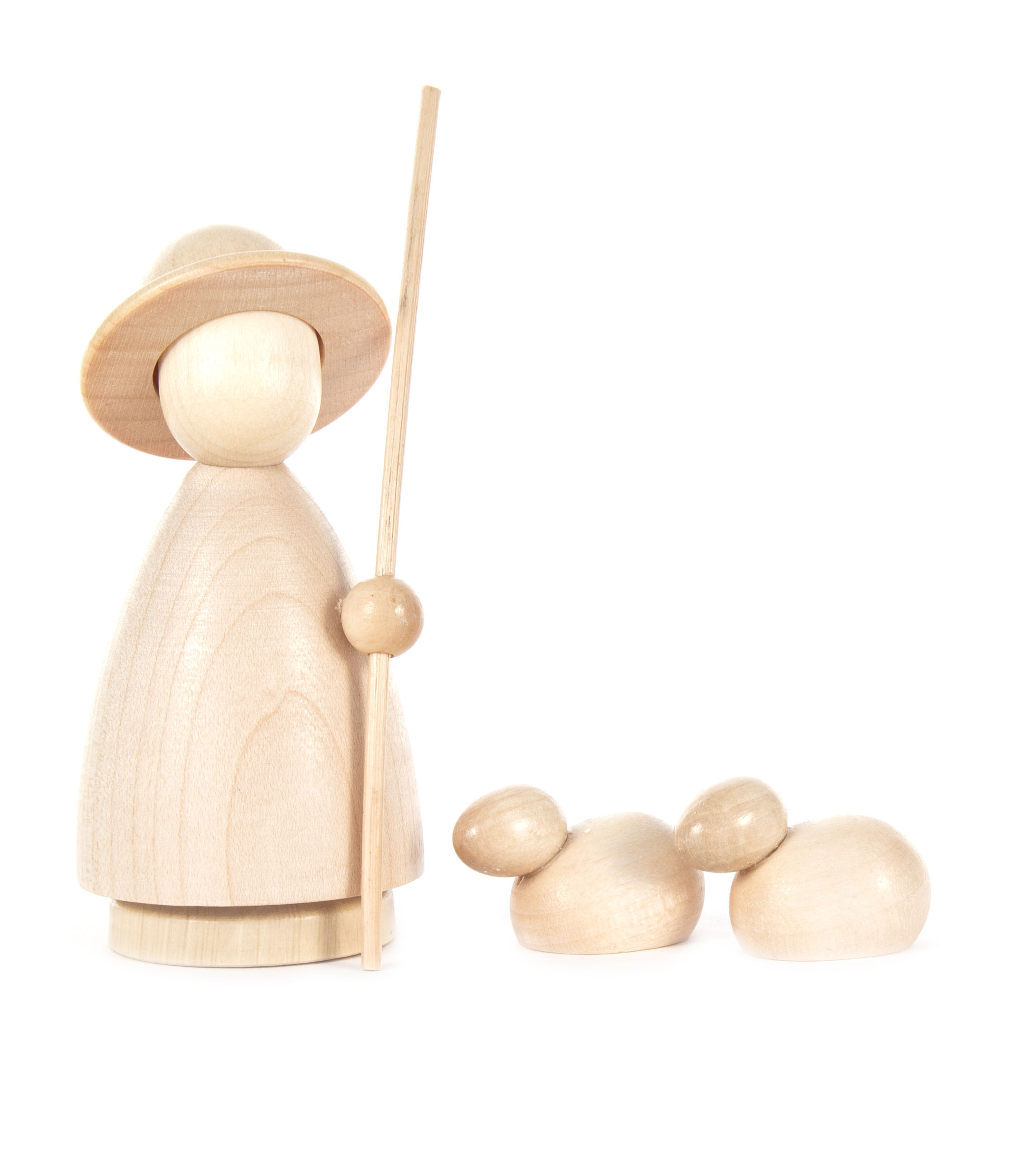 Minimalistic wooden figure of a shepherd holding a staff with two small sheep lying beside, crafted in a natural wood finish.