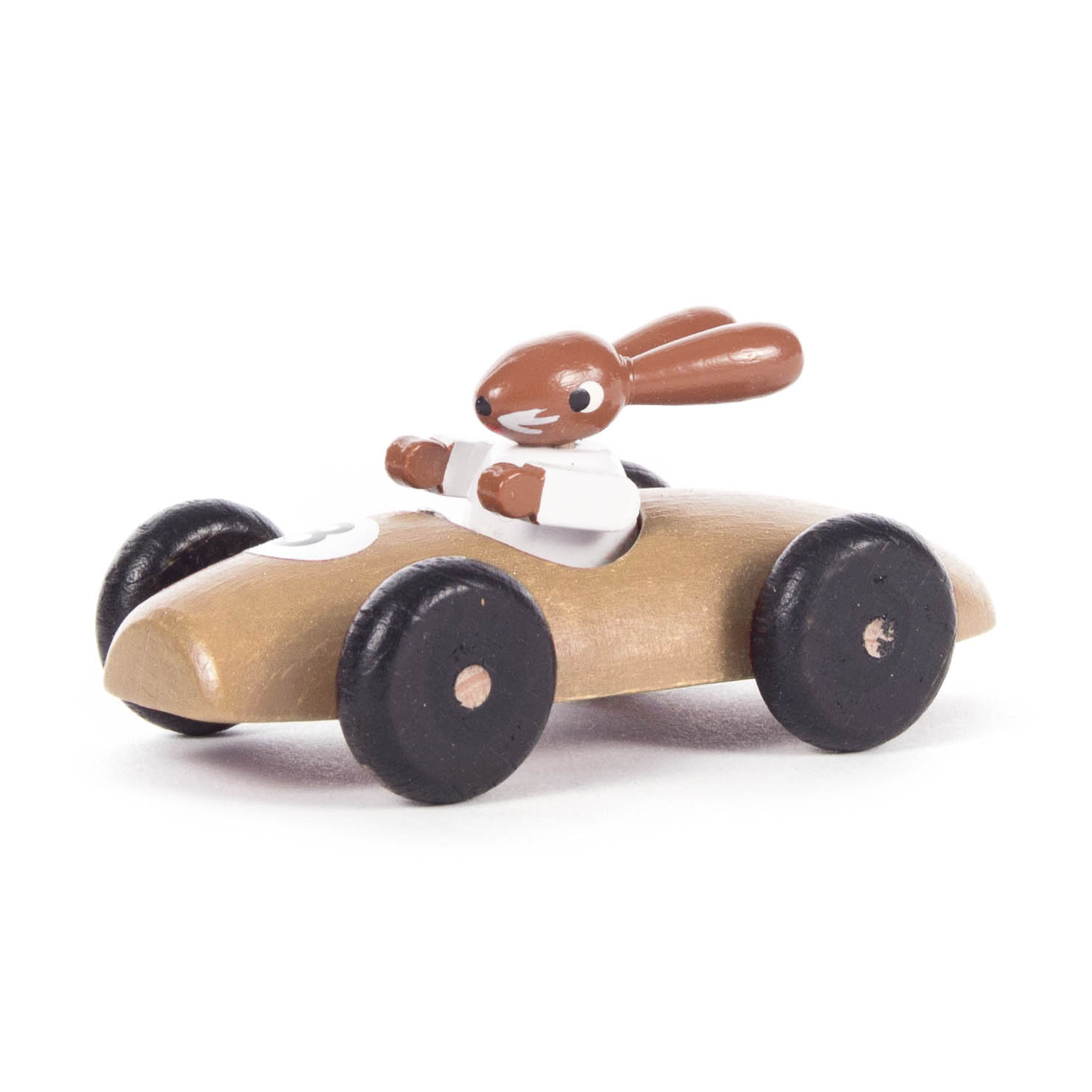 Kleines Holzrennauto mit einem braunen Hasen als Fahrer. Das Auto ist naturfarben mit schwarzen Rädern. im Dregeno Online Shop günstig kaufen