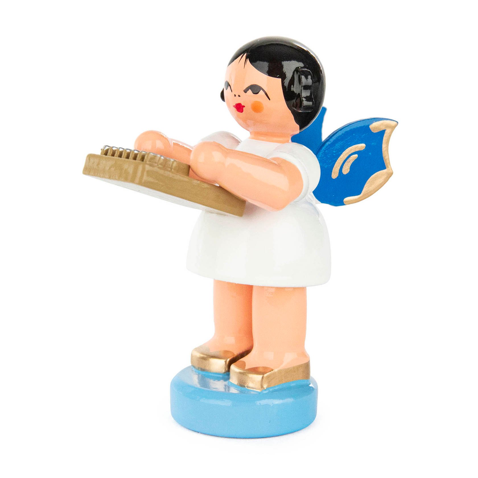 Engelfigur mit weißem Kleid und blauen Flügeln, die eine Kalimba in den Händen hält. im Dregeno Online Shop günstig kaufen