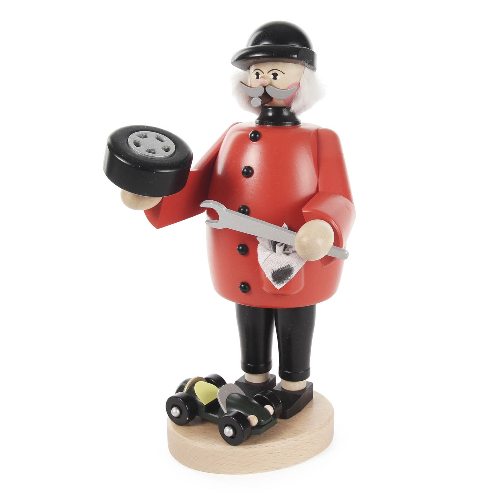 Wooden incense smoker figurine depicting a mechanic, wearing a red coat and black hat, holding a wrench and a car part, with a tiny car at his feet. im Dregeno Online Shop günstig kaufen