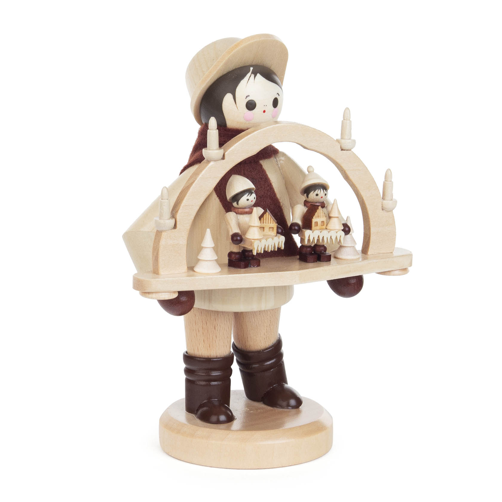 Wooden figurine of a young boy in traditional attire, holding an arch-shaped candle holder with two small figures and trees.