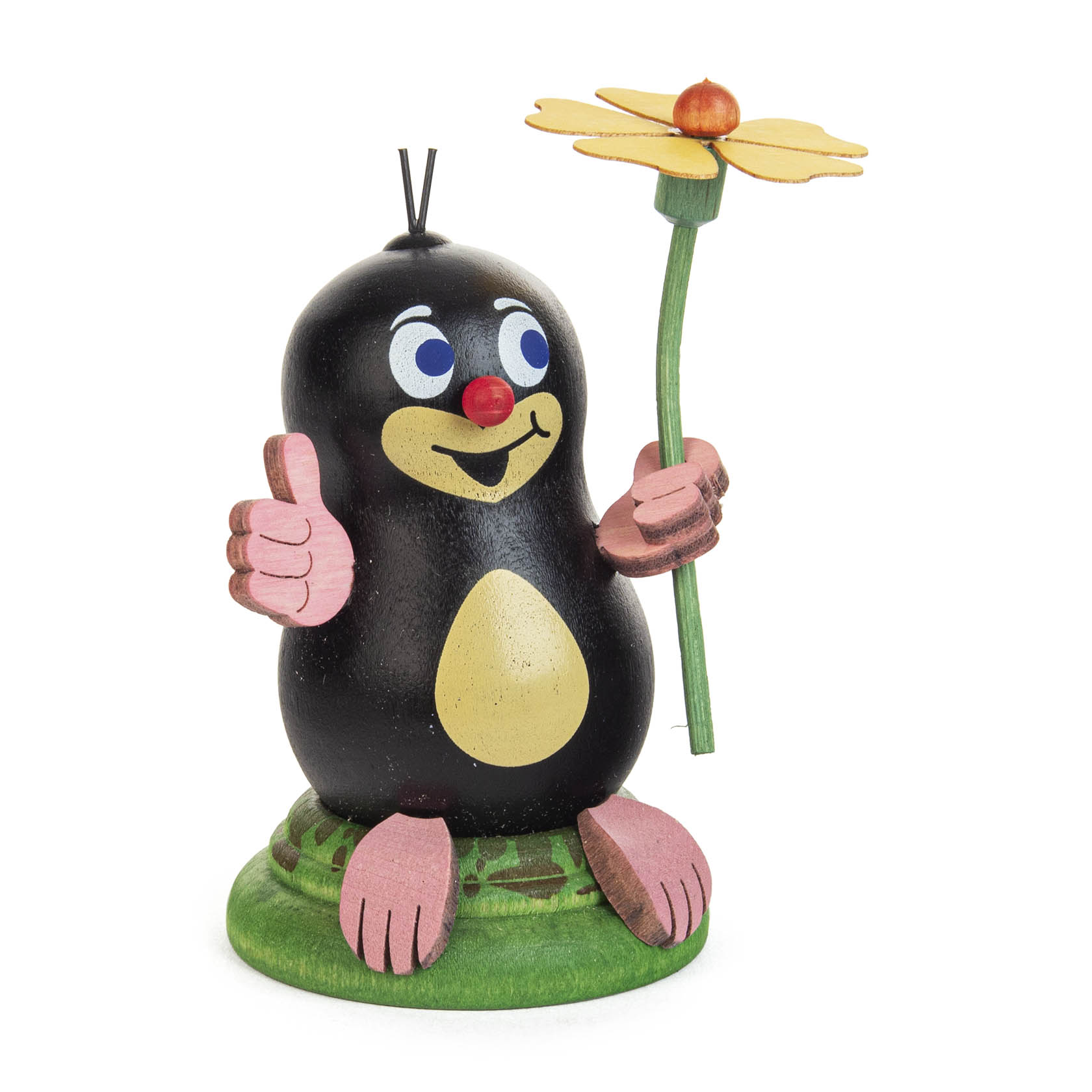 Holzfigur eines stilisierten Maulwurfs mit rosa Nase und Händen, ein Daumen hoch und eine gelbe Blume in der anderen Hand haltend. im Dregeno Online Shop günstig kaufen