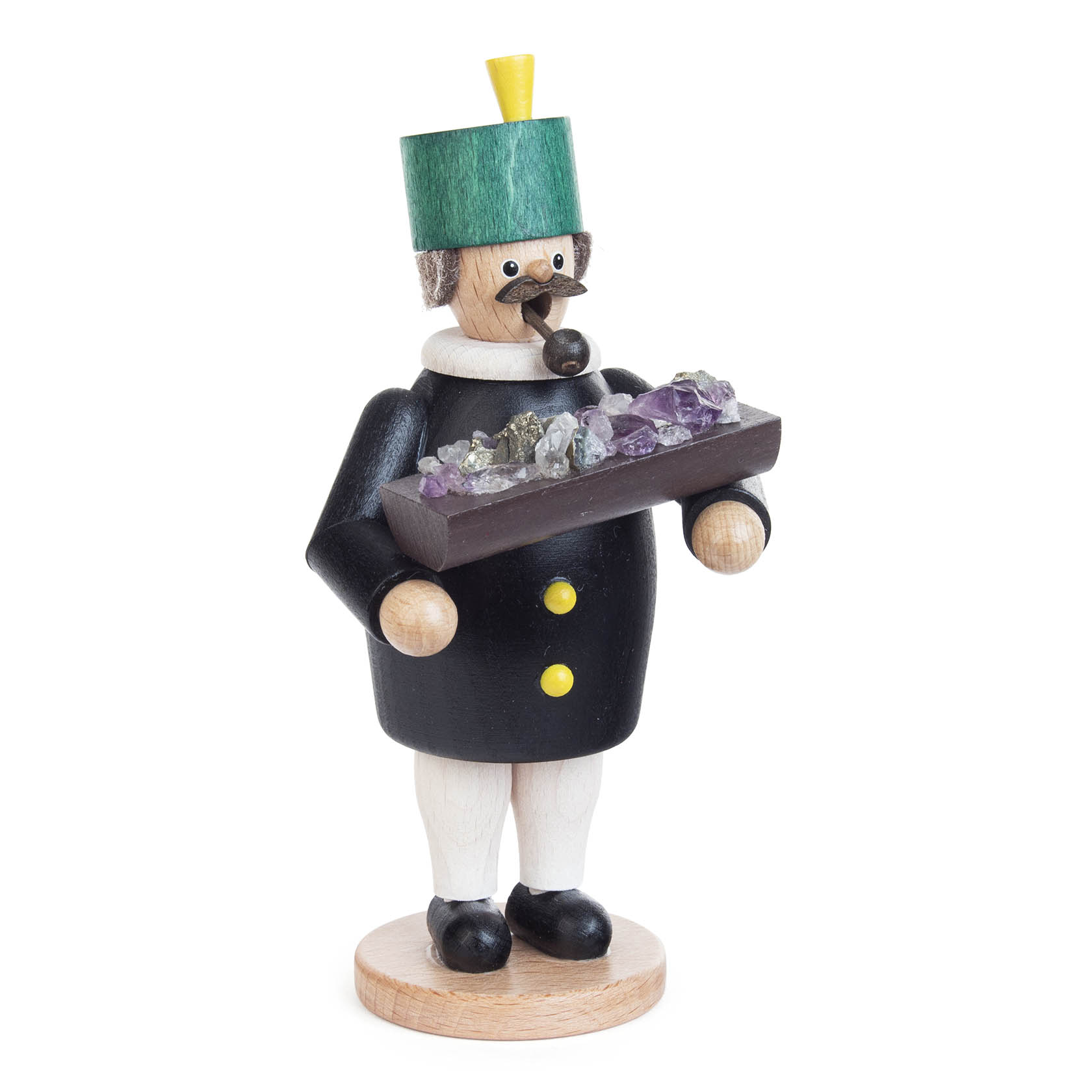 A wooden incense smoker figurine of a miner holding a tray with colorful ore pieces. He wears a green hat, black coat with yellow buttons, and a pipe.