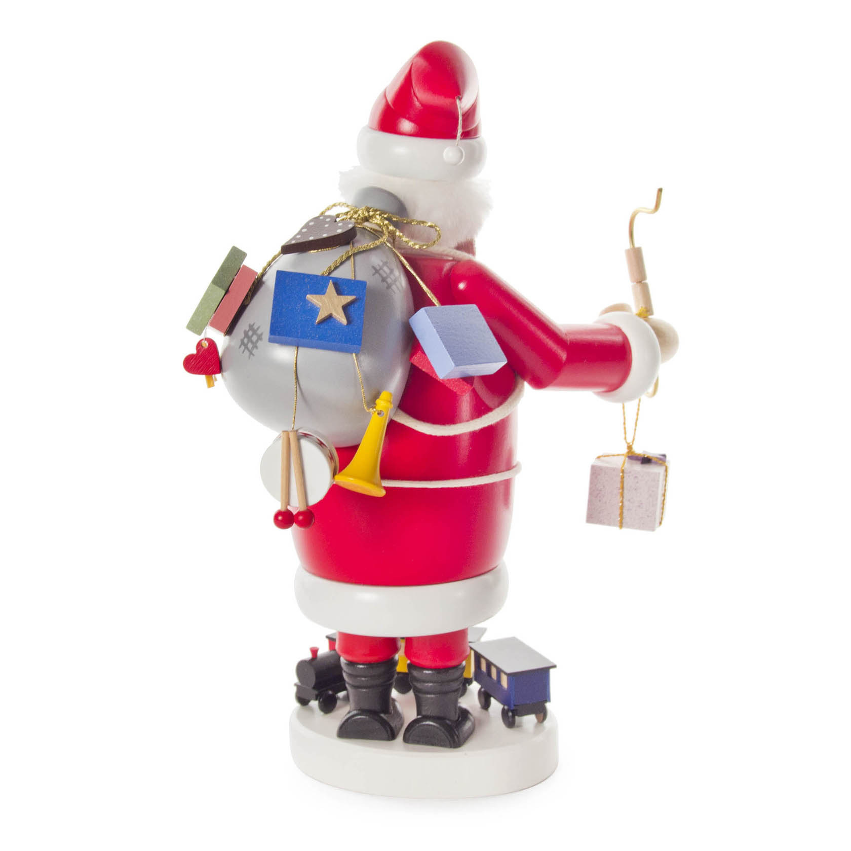 A red Santa Claus incense smoker figurine with a gift sack and a toy train at its feet, viewed from behind.