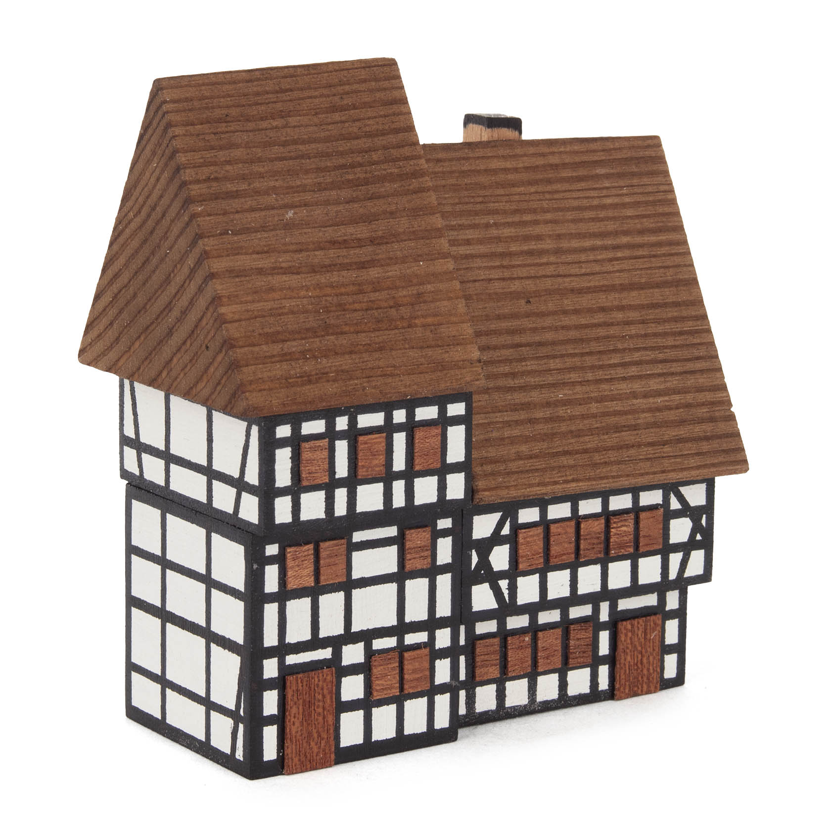 Model of a traditional timber-framed city duplex with white panels and brown wooden beams, featuring steep gabled roofs. im Dregeno Online Shop günstig kaufen