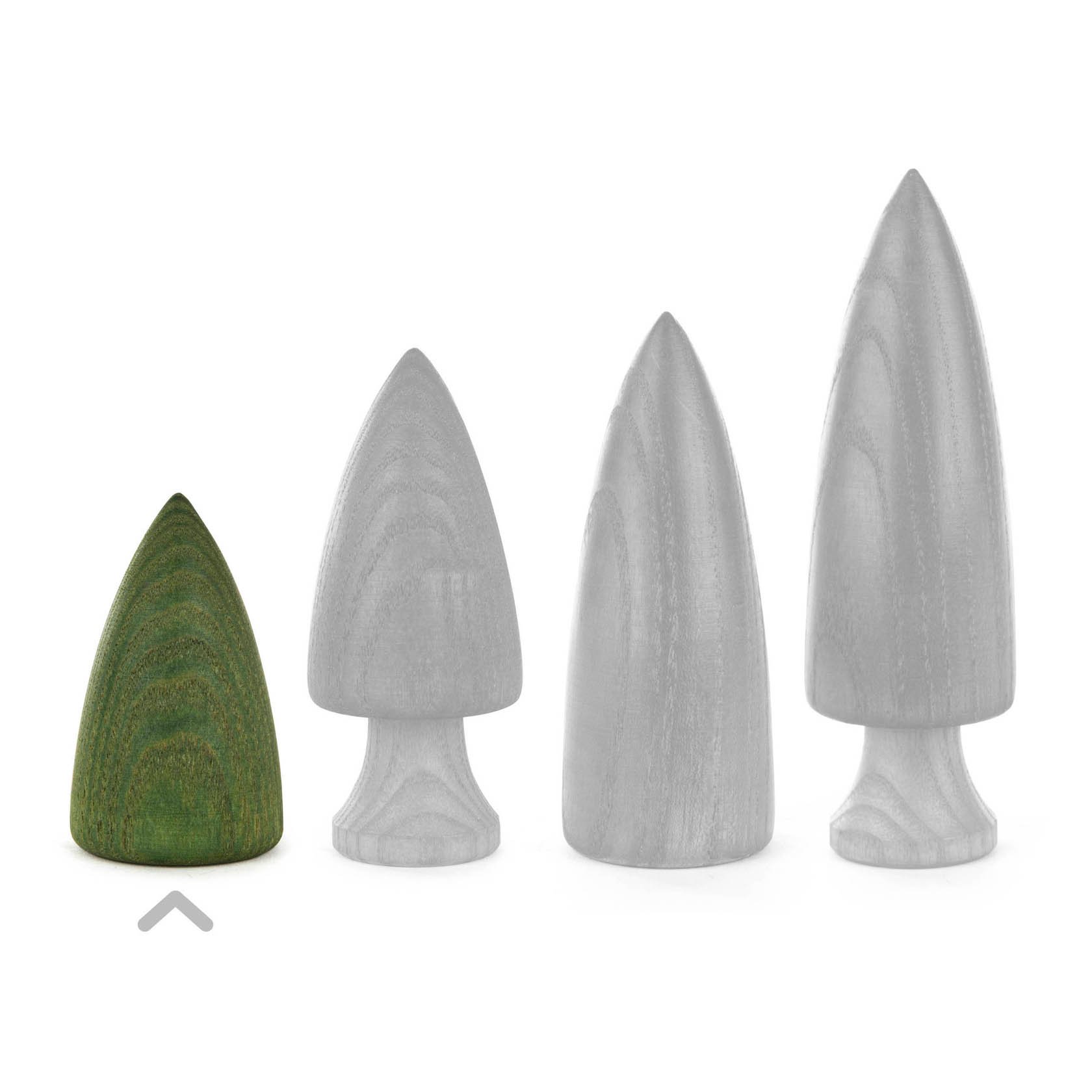 A small green wooden tree figurine, 6.5 cm tall, next to larger gray wooden tree figures.
