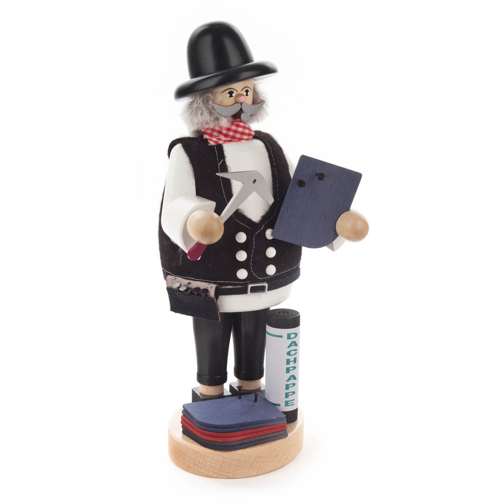 Smoking figure of a roofer holding a hammer and a piece of slate, wearing traditional attire with a tall hat, standing on a base with roofing materials.