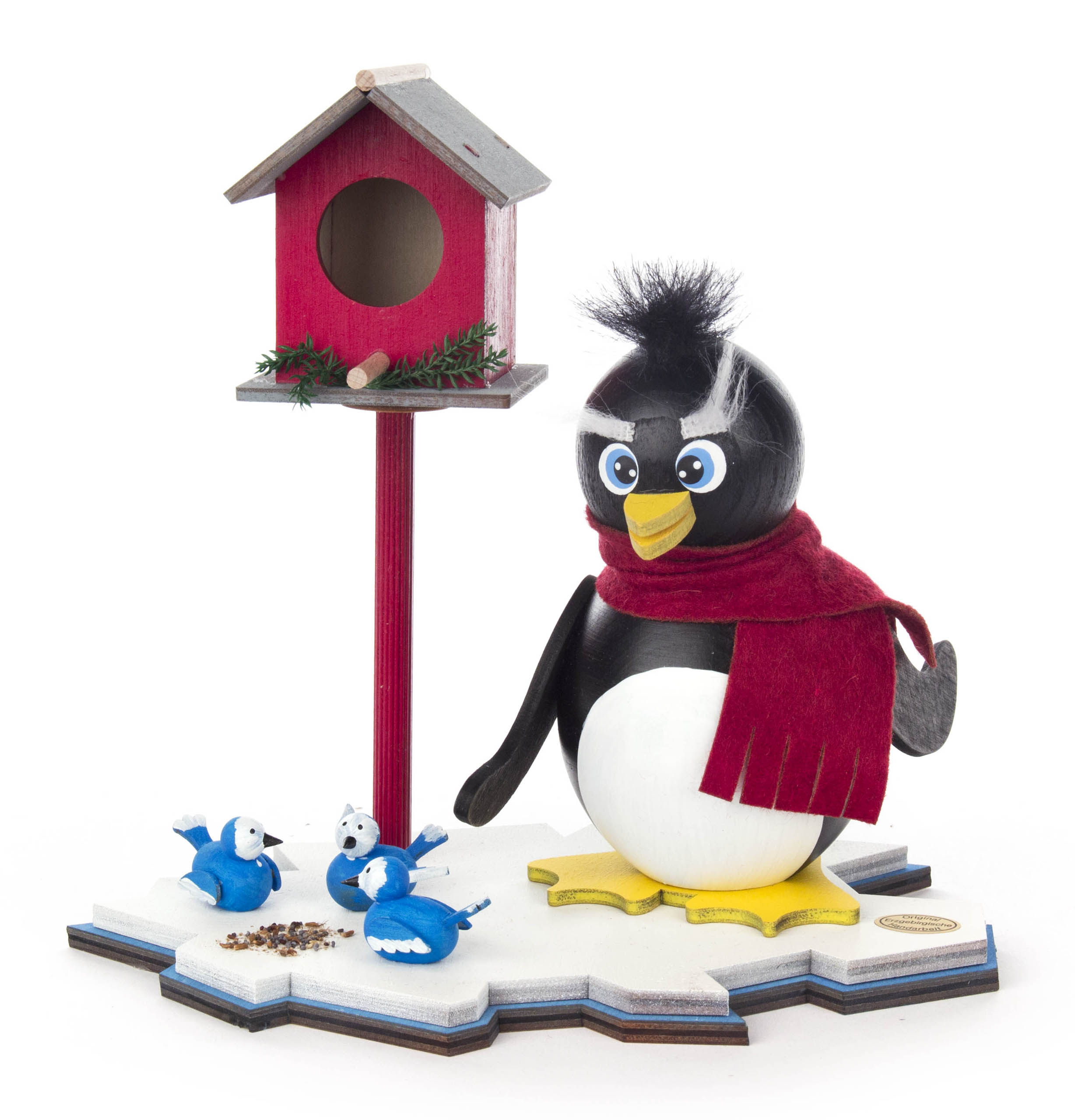 Räucherpinguin Pit am Vogelhaus  